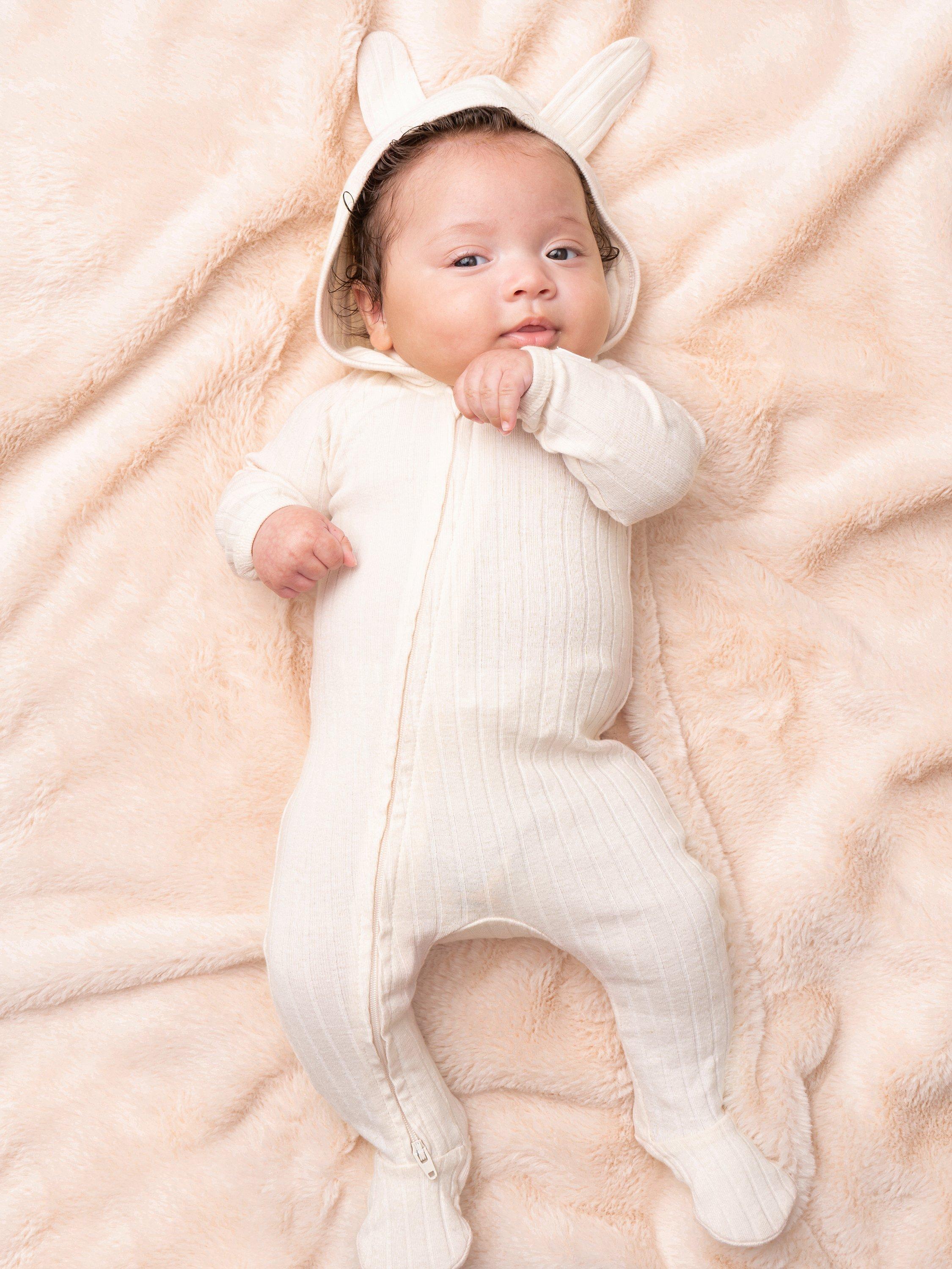 Product image 1 of 3, which shows Angel & Rocket Baby Bunny Onesie, Natural, 0-3 months