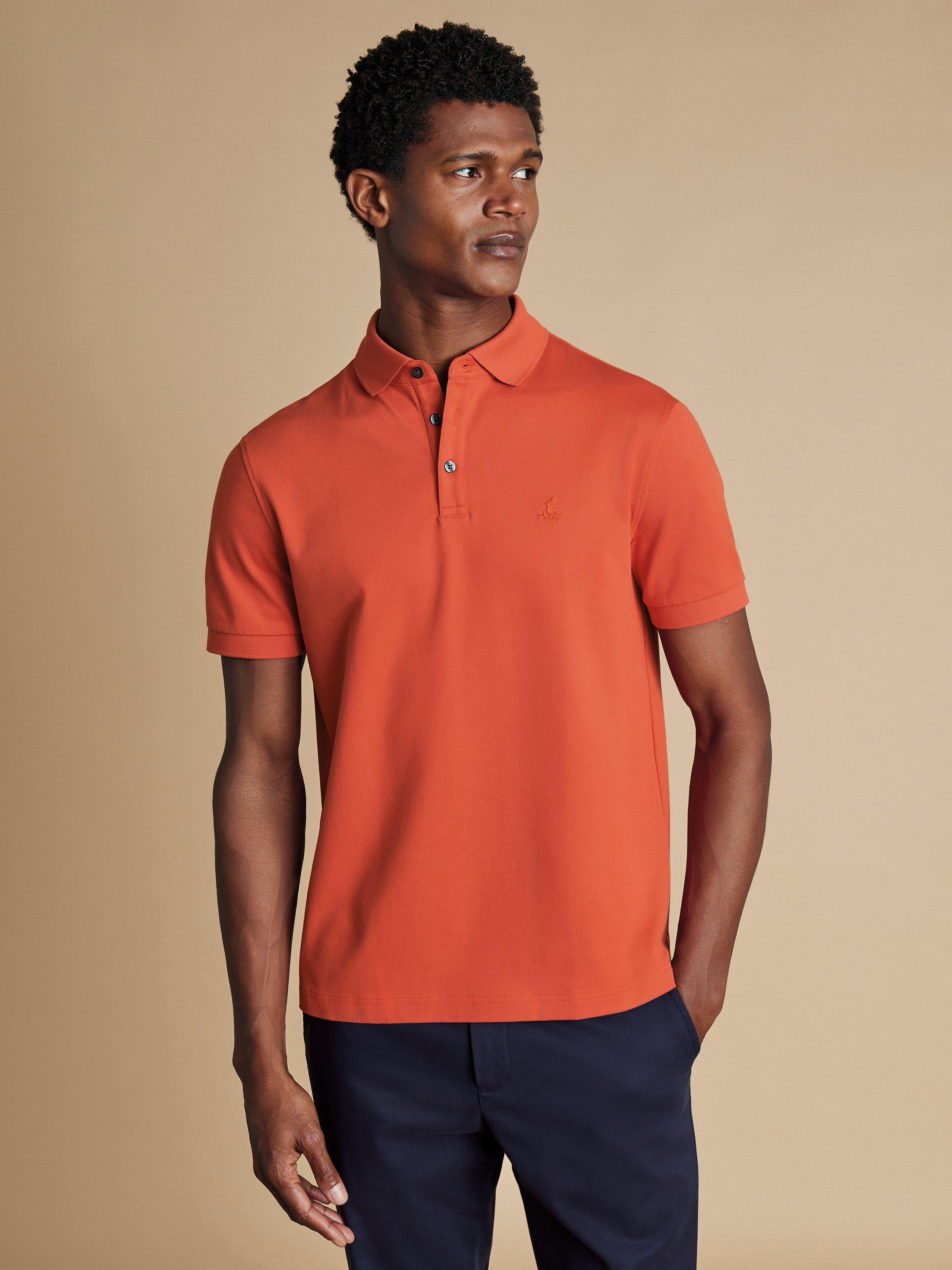 Product image 1 of 5, which shows Charles Tyrwhitt Cotton Regular Fit Polo Shirt, Orange, S