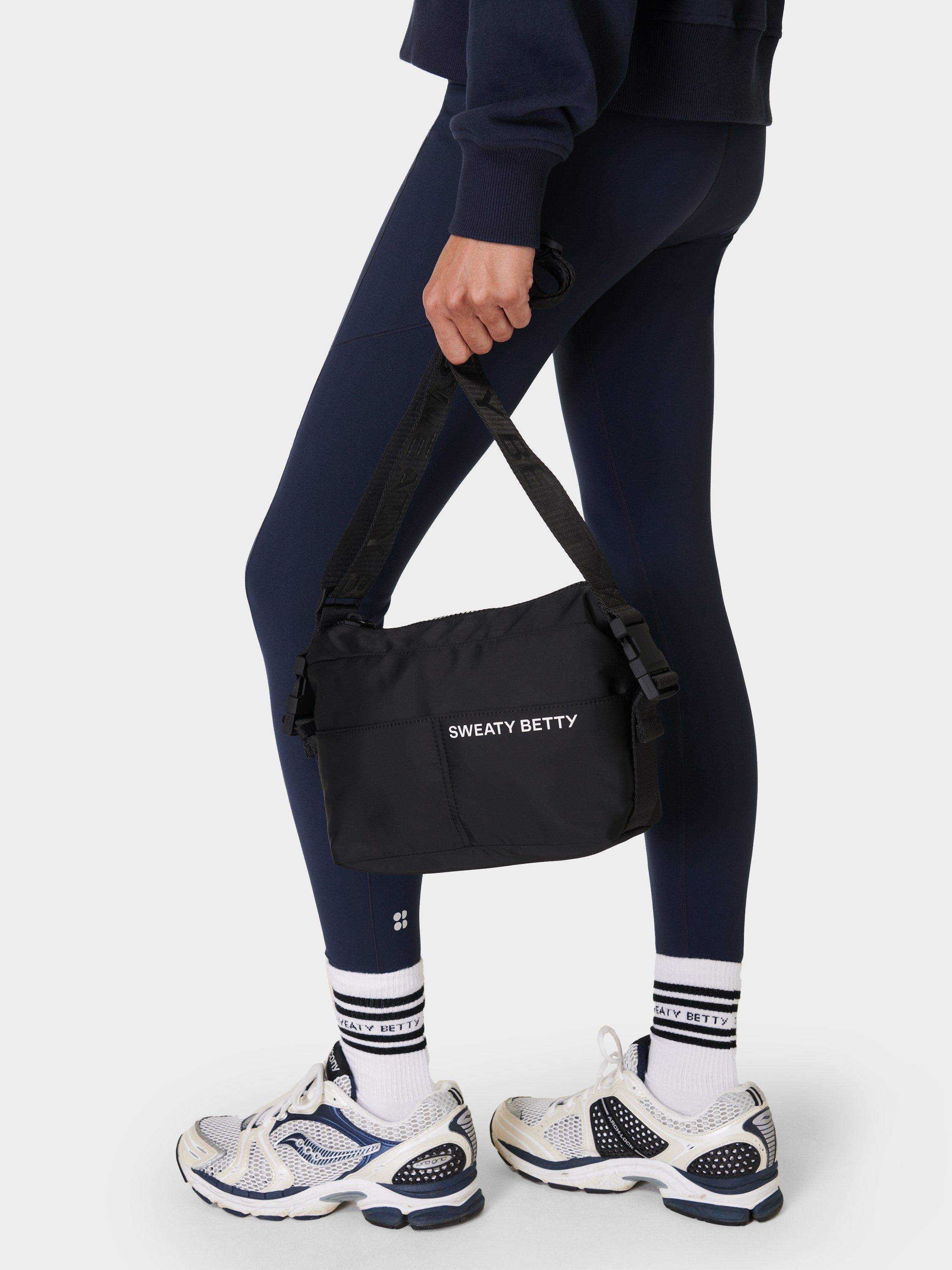 Product image 2 of 5, which shows Sweaty Betty Strive Crossbody Bag, Black