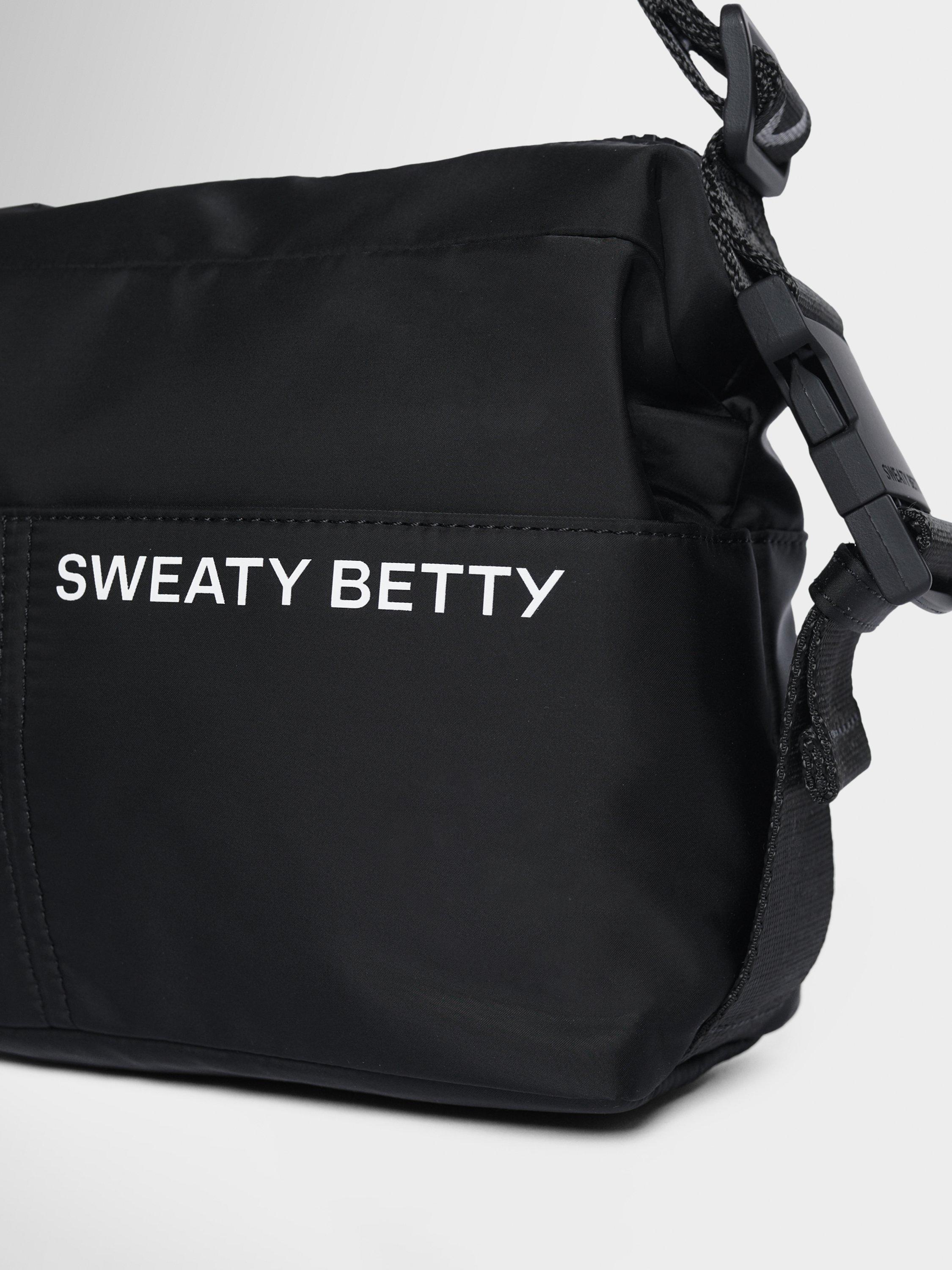 Product image 3 of 5, which shows Sweaty Betty Strive Crossbody Bag, Black