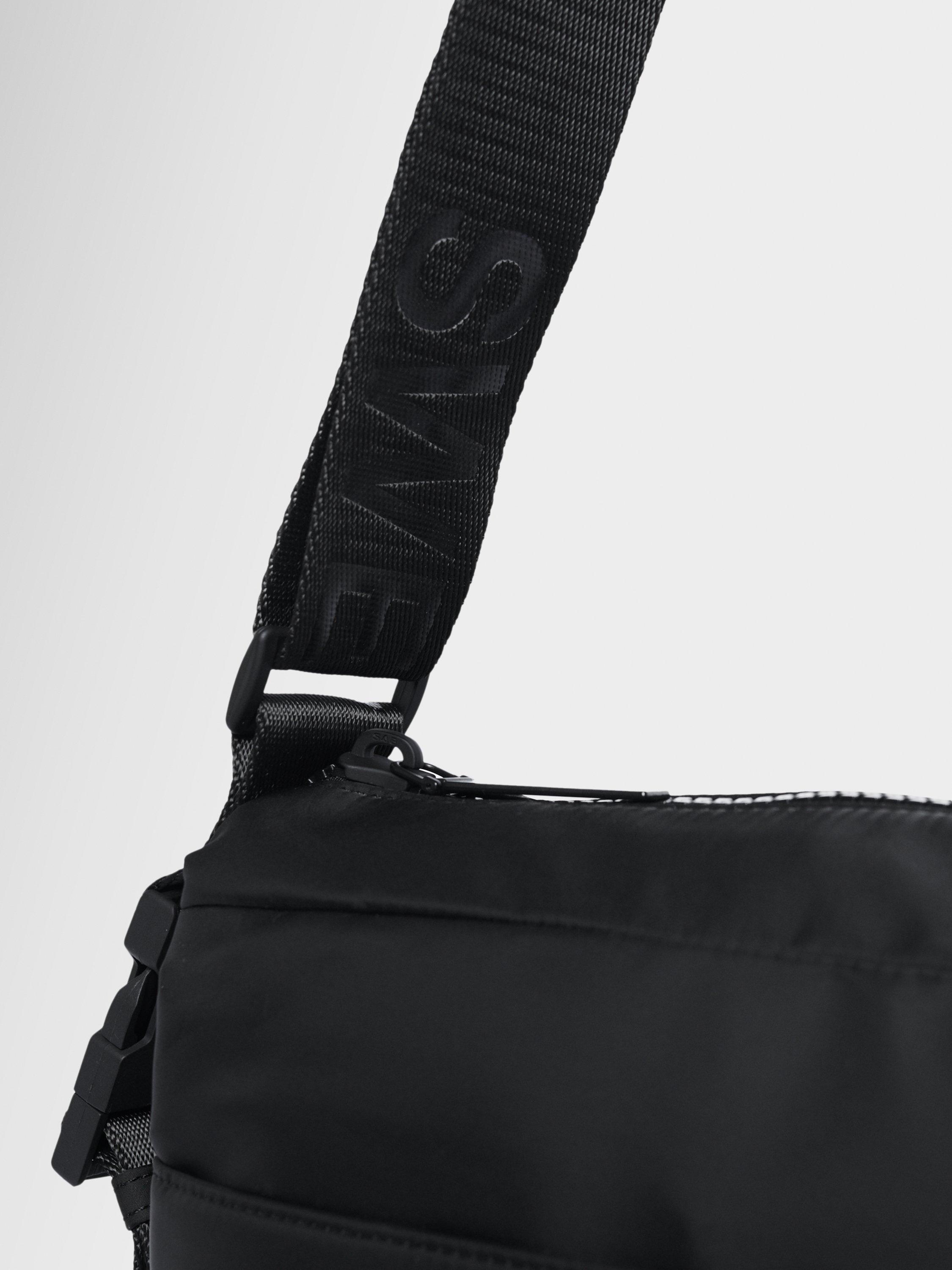 Product image 4 of 5, which shows Sweaty Betty Strive Crossbody Bag, Black