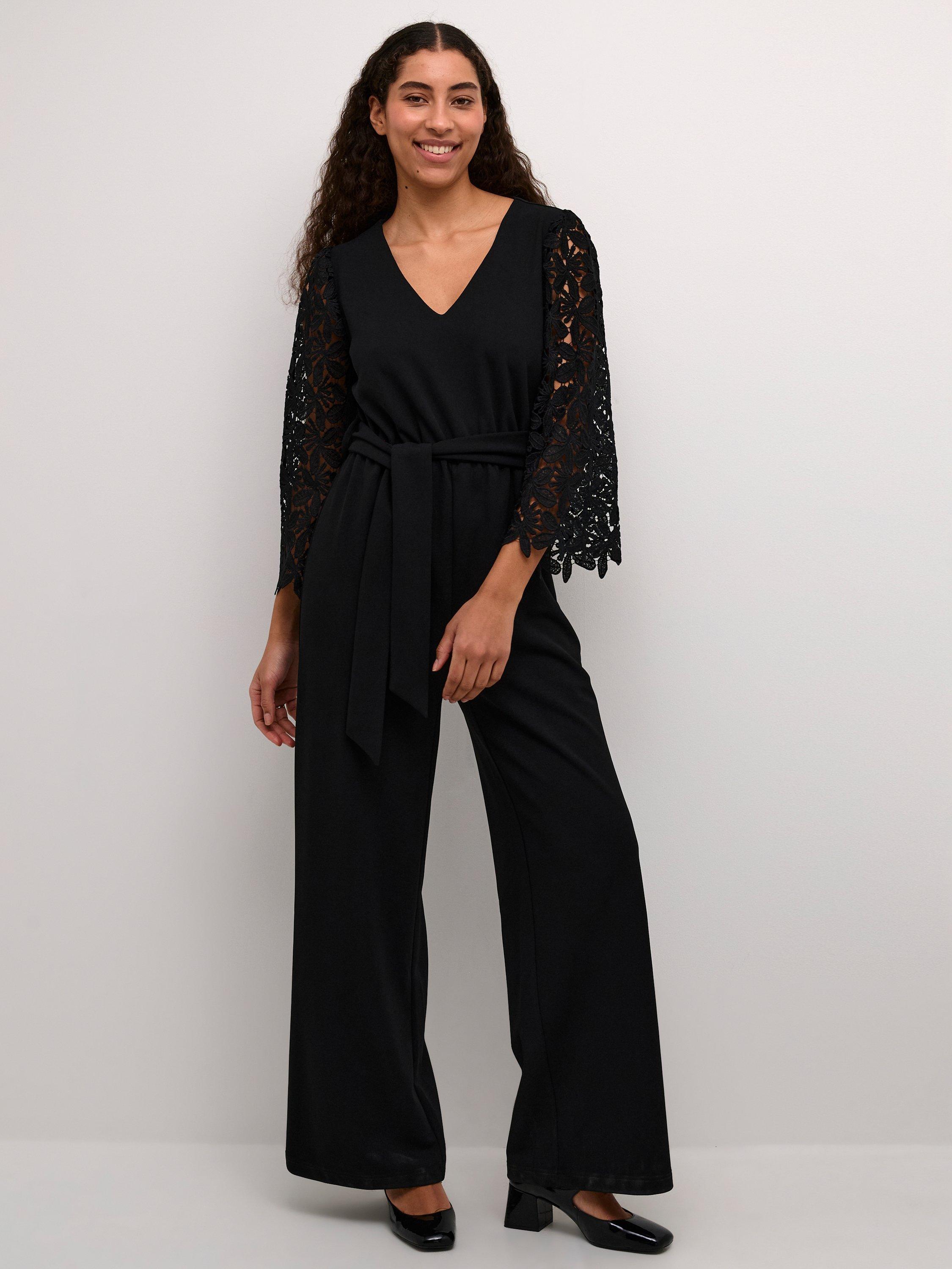 Product image 1 of 4, which shows KAFFE Emily Lace Sleeve Jumpsuit, Deep Black, XS