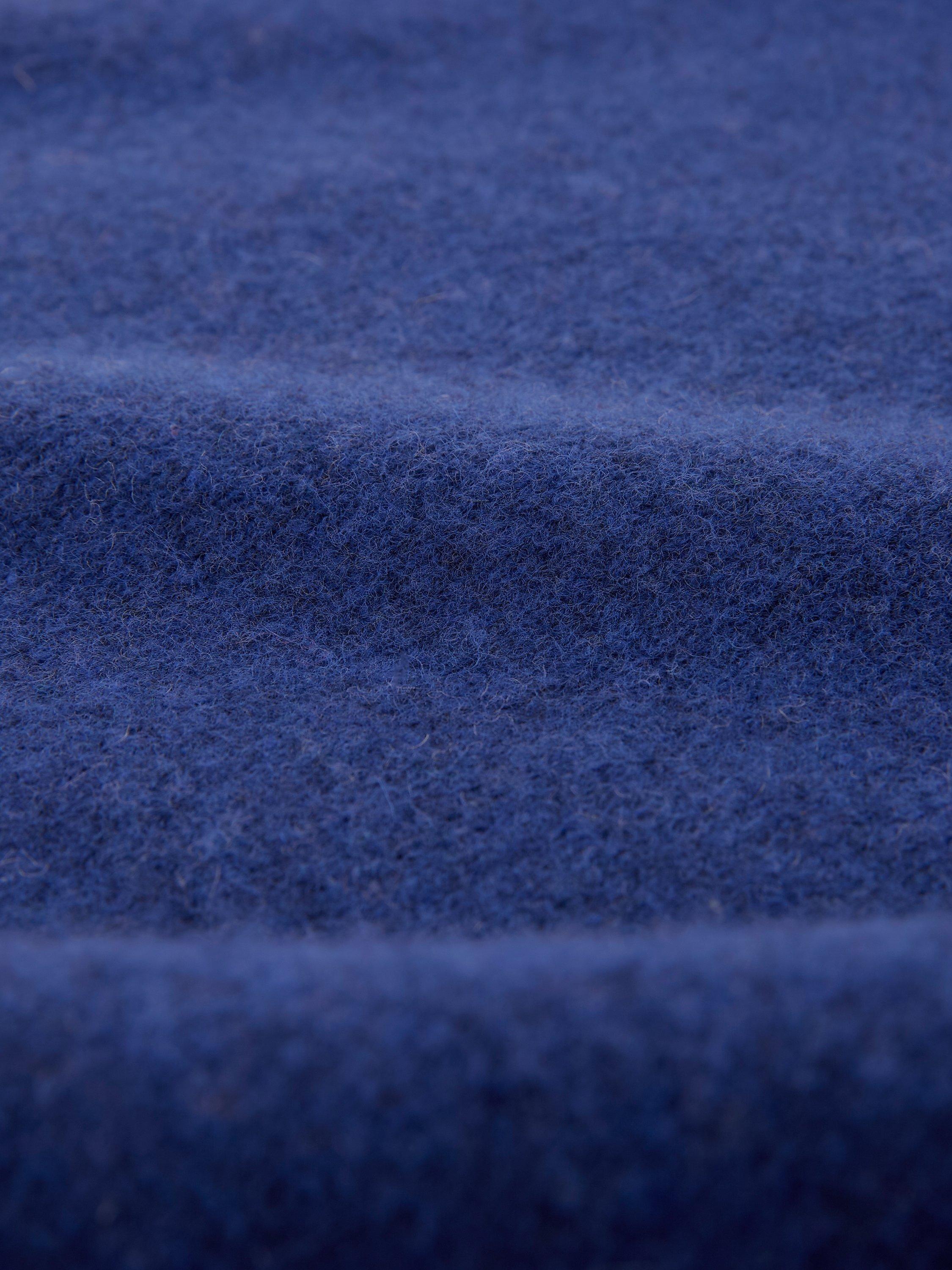 Product image 4 of 7, which shows Celtic & Co. Felted Funnel Neck Merino Wool Jumper, Blue Ink, XS