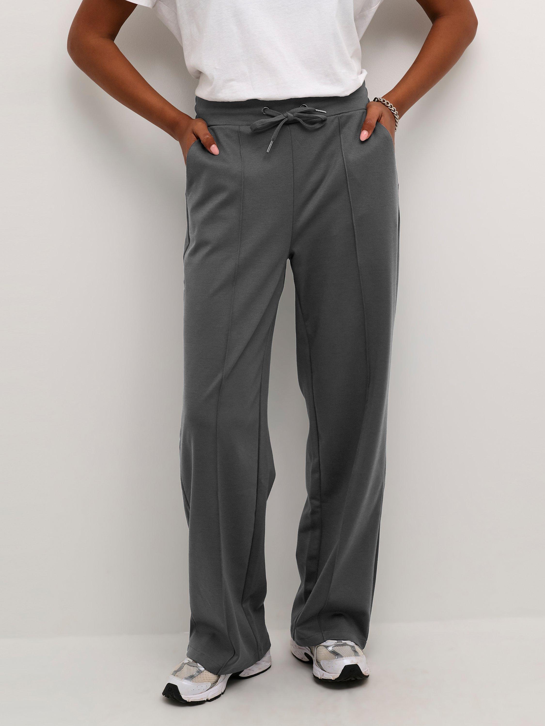 Product image 1 of 6, which shows KAFFE Jenny Wide Leg Tie Waist Trousers, Black Oyster, XS