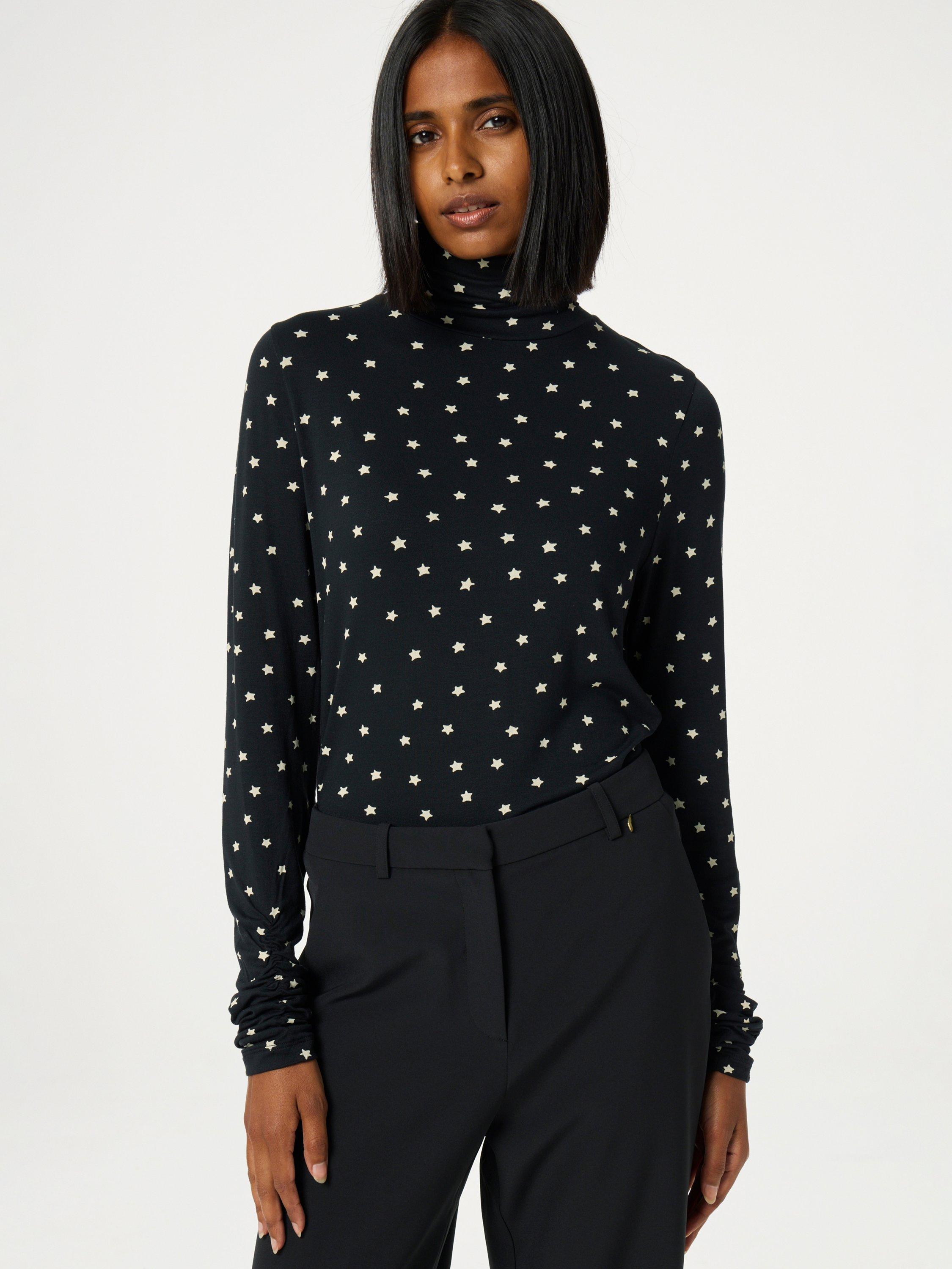 Product image 1 of 4, which shows Fabienne Chapot Jade Star Turtleneck Top, Black/White, XS