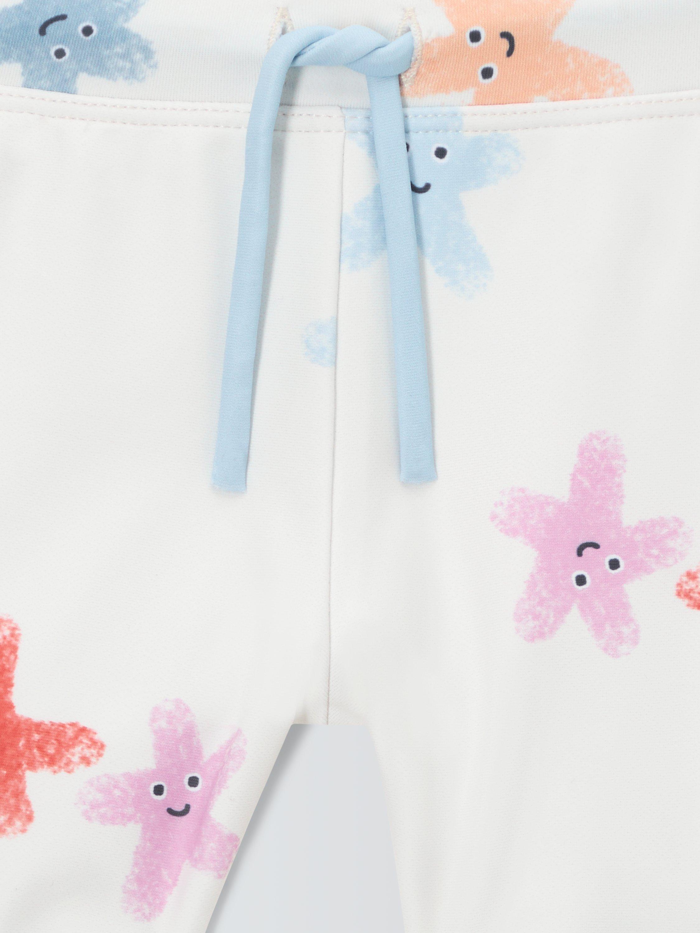 Product image 3 of 3, which shows John Lewis Baby Starfish Swimming Trunks, White, 3-6 months