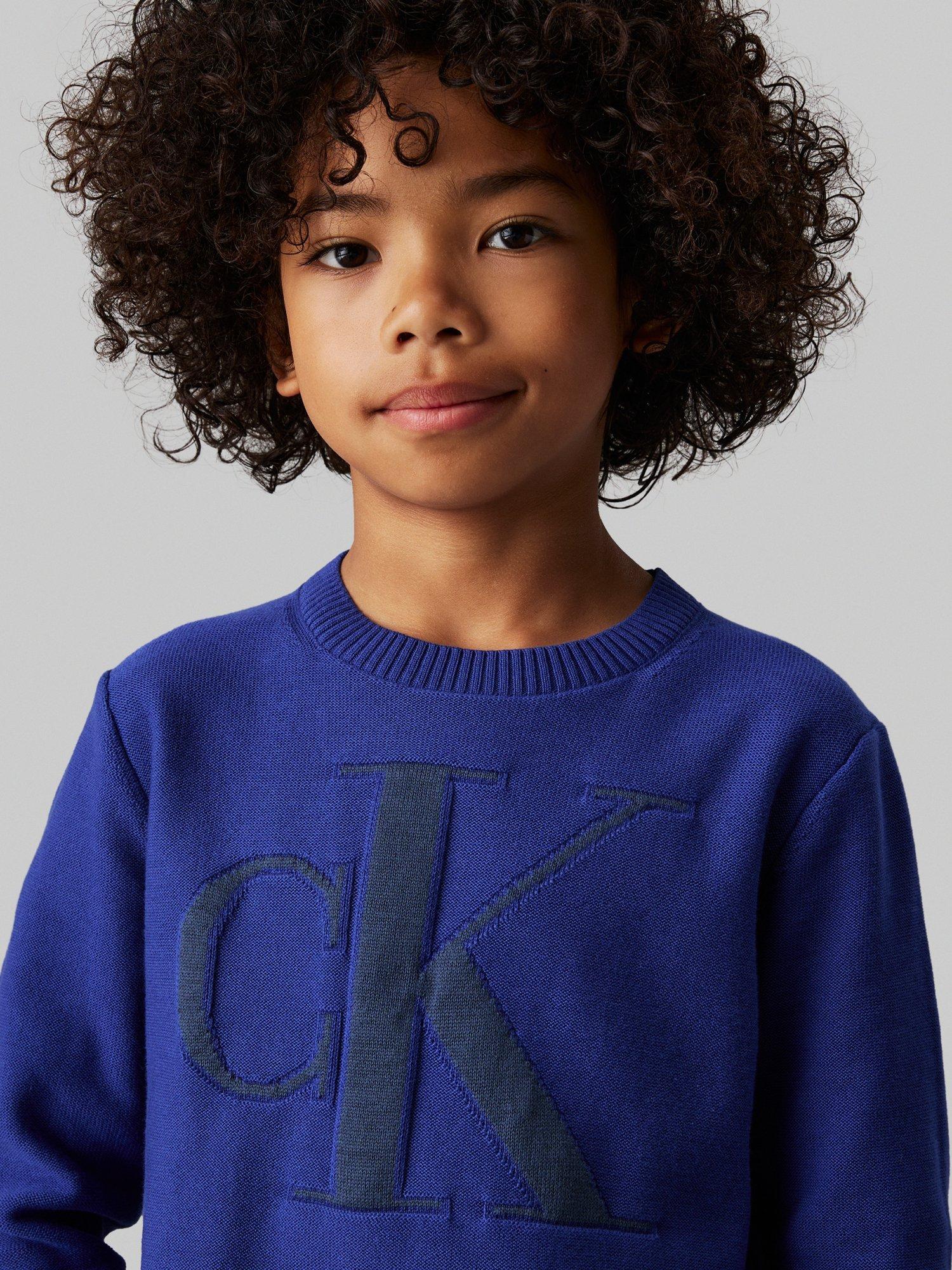 Product image 3 of 4, which shows Calvin Klein Kids' Organic Cotton Monogram Logo Jumper, Pigment Blue, 10 years