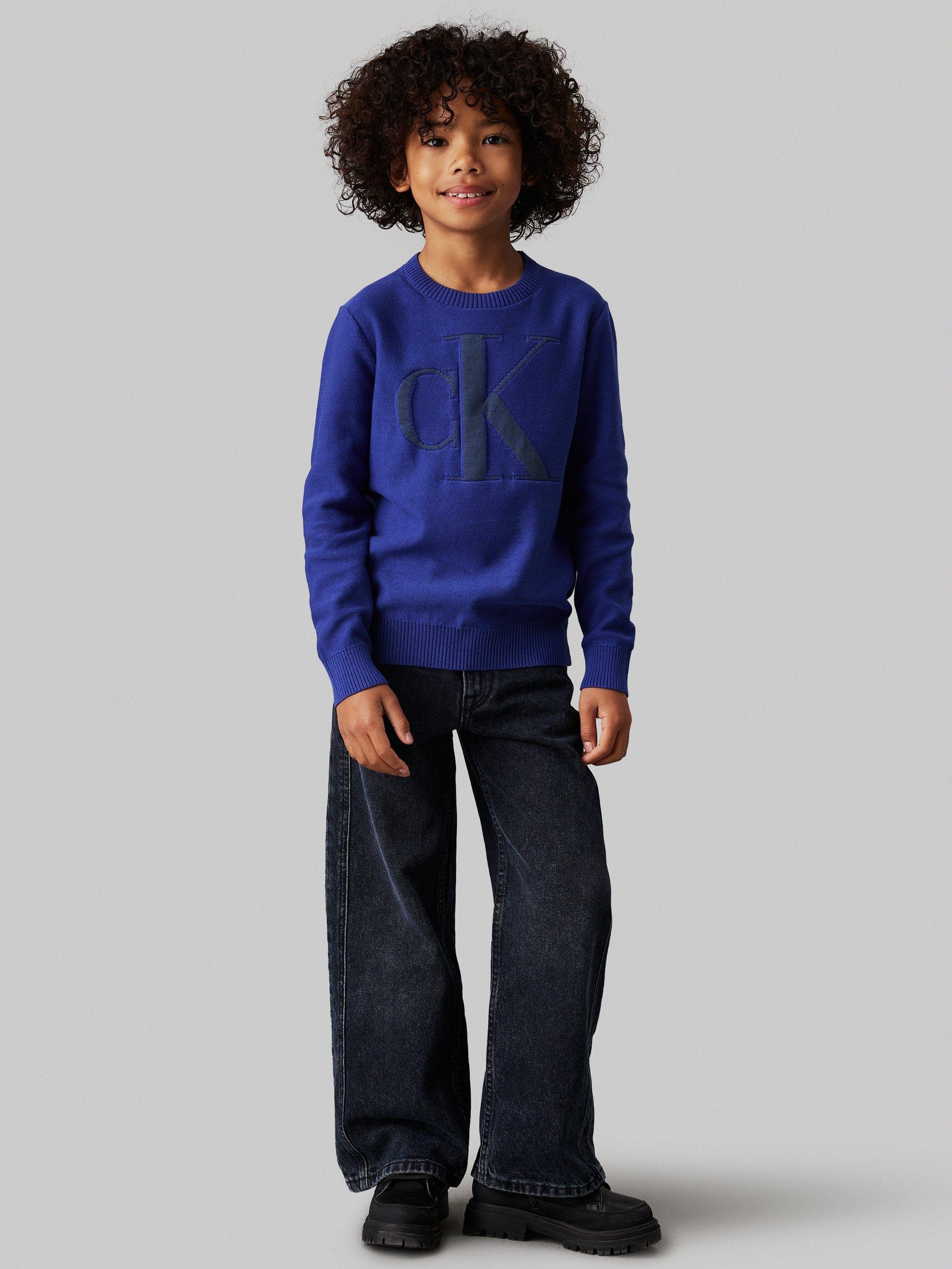 Product image 4 of 4, which shows Calvin Klein Kids' Organic Cotton Monogram Logo Jumper, Pigment Blue, 10 years