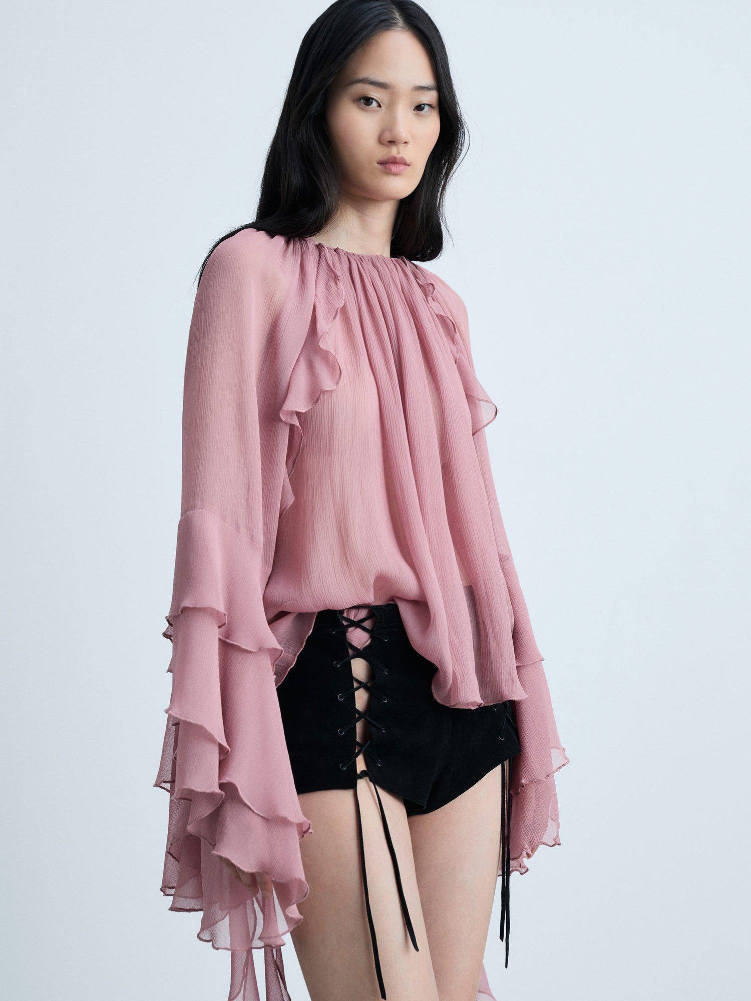 Pink ruffle top online