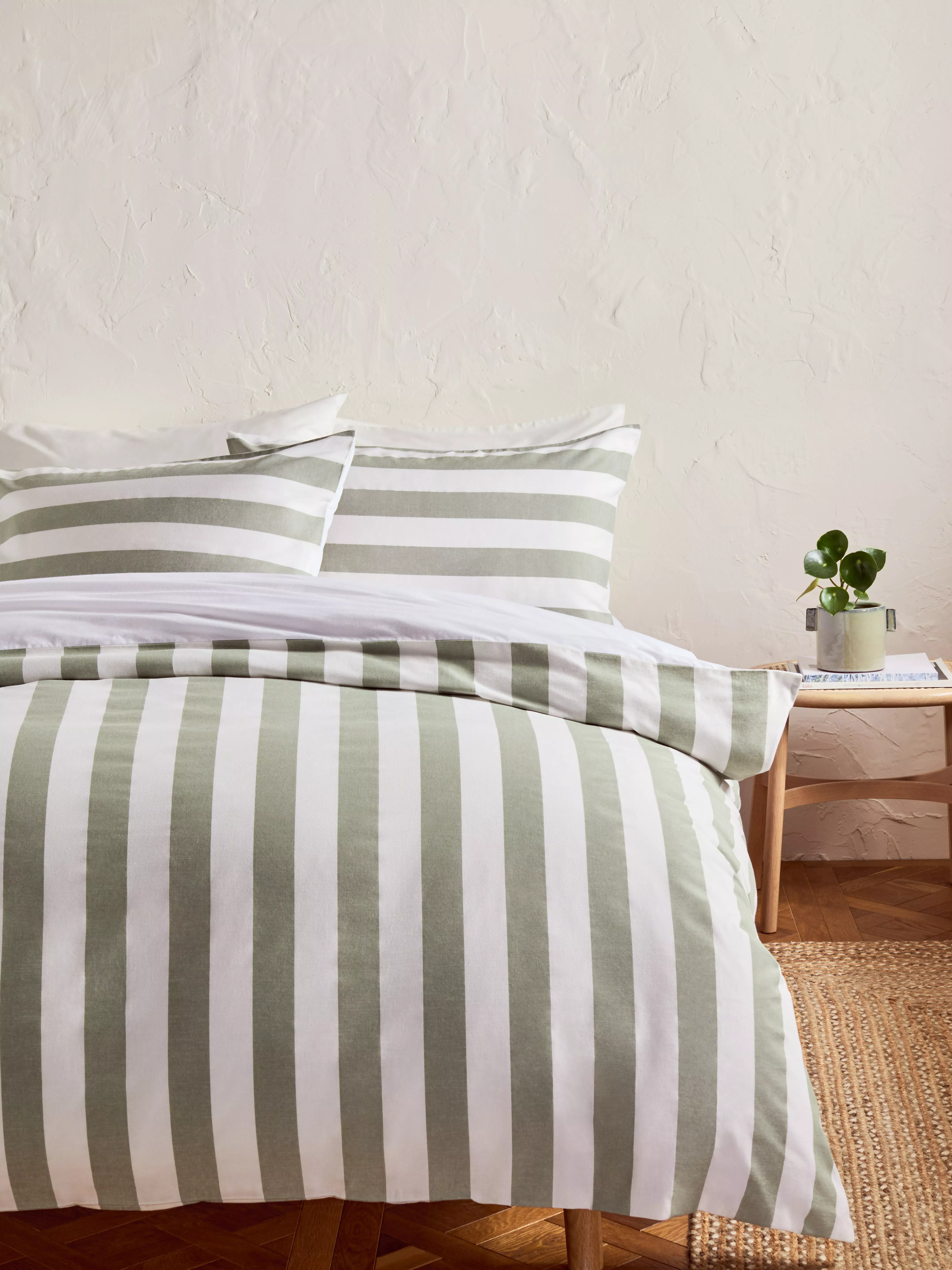 Pinstriped blue and white bedding