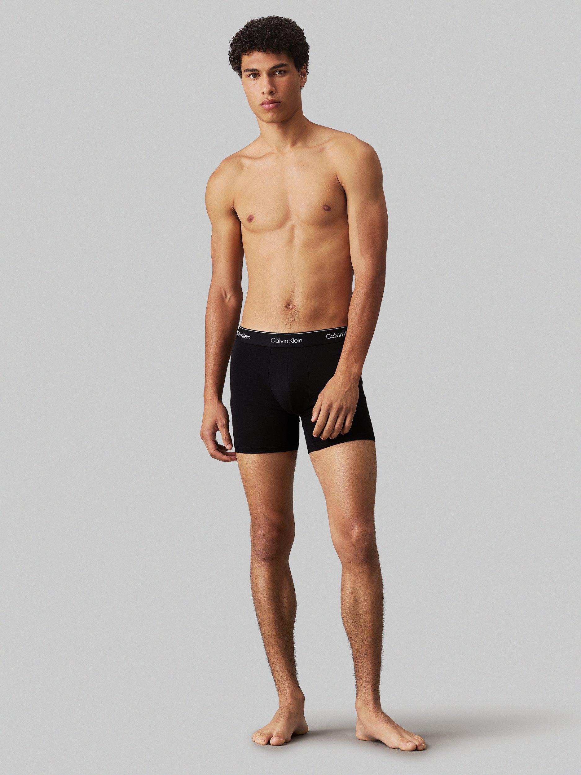 Product image 5 of 5, which shows Calvin Klein Cotton Stretch Boxer Brief, Pack of 3, Black W/ Black Wb, XS