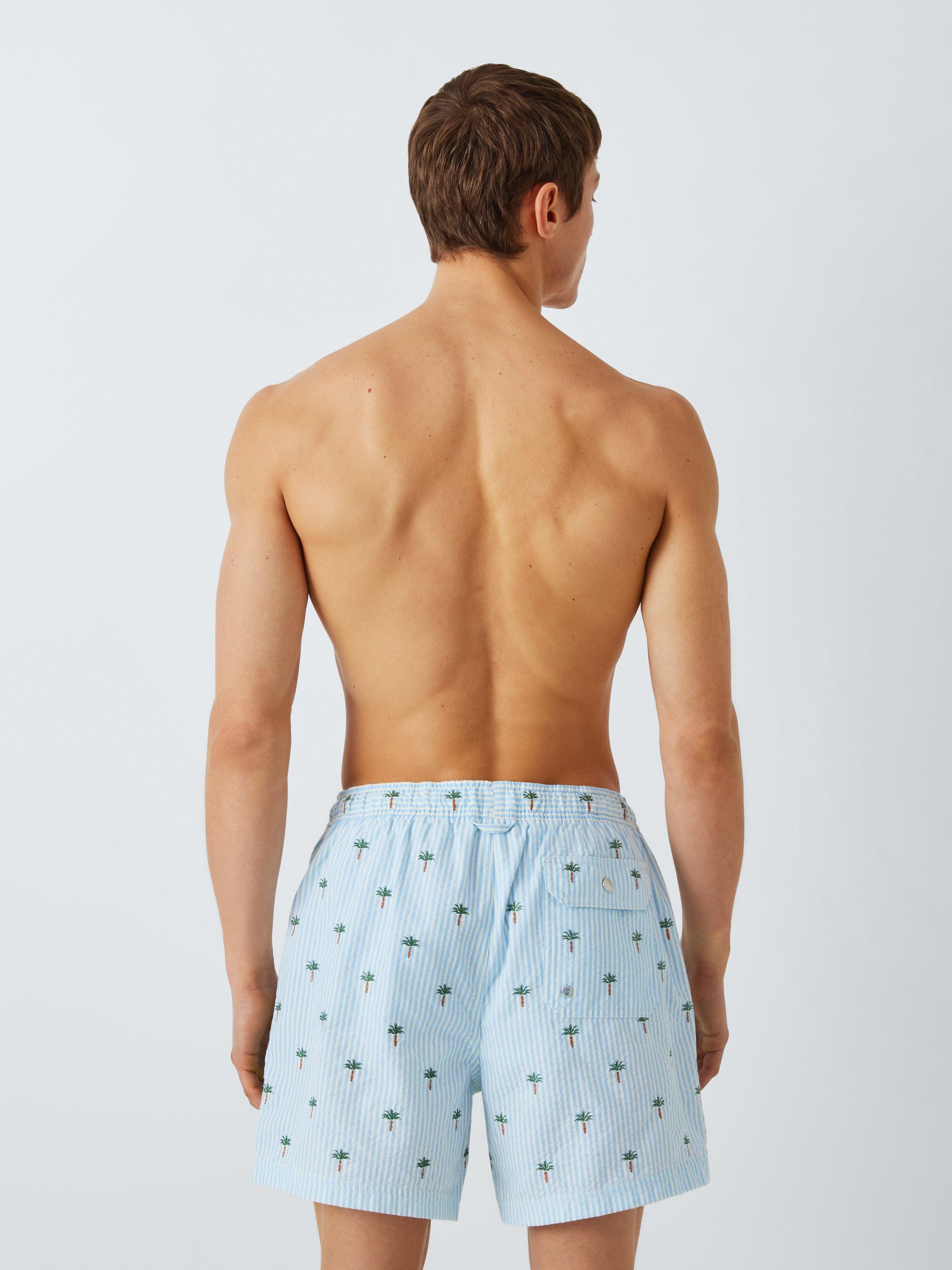 Product image 2 of 6, which shows John Lewis Embroidered Palm Seersucker Swim Shorts, Blue Multi, S