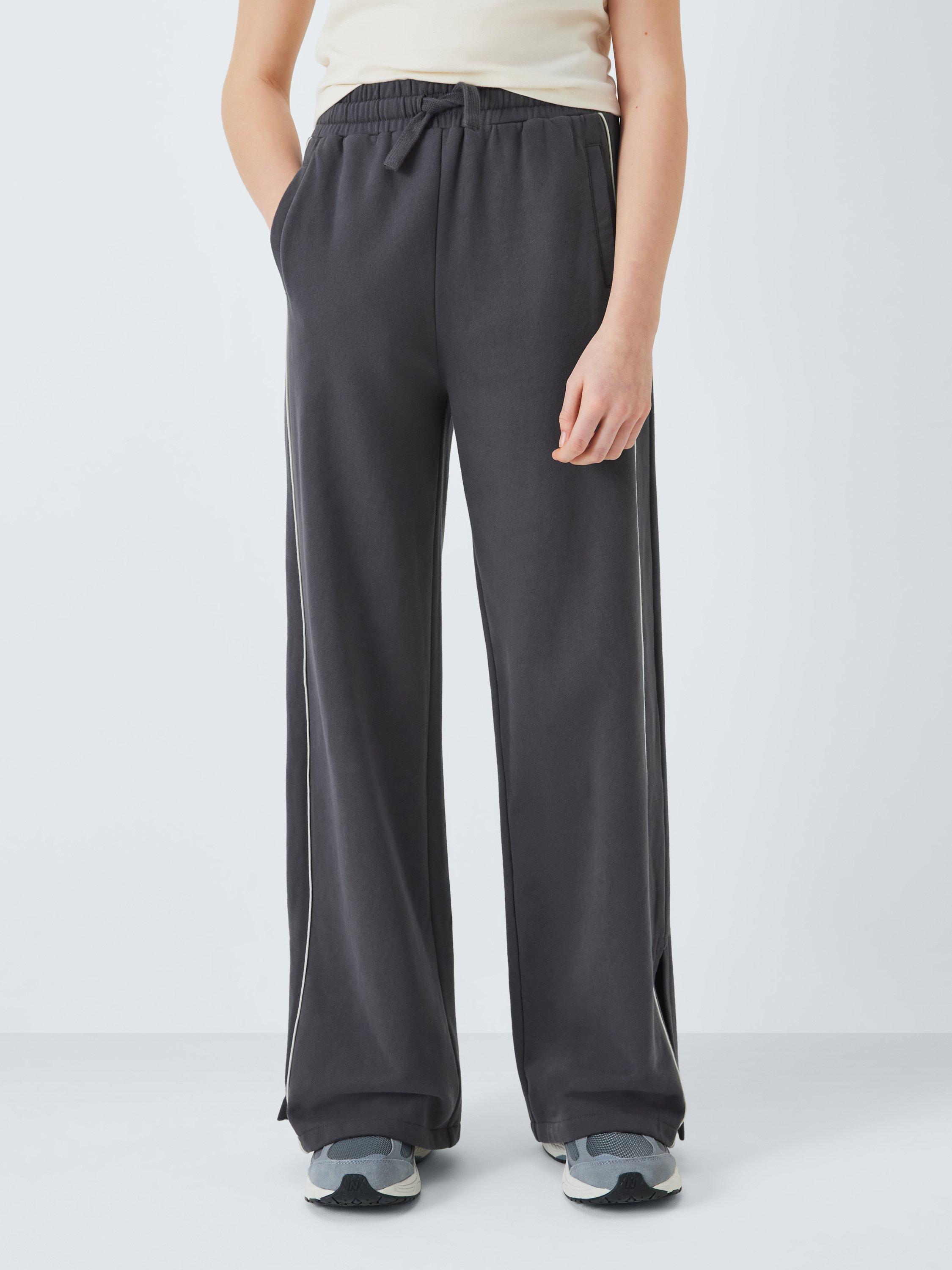 Product image 1 of 7, which shows John Lewis Kids' Side Stripe Wide Leg Joggers, Grey/White, 8 years