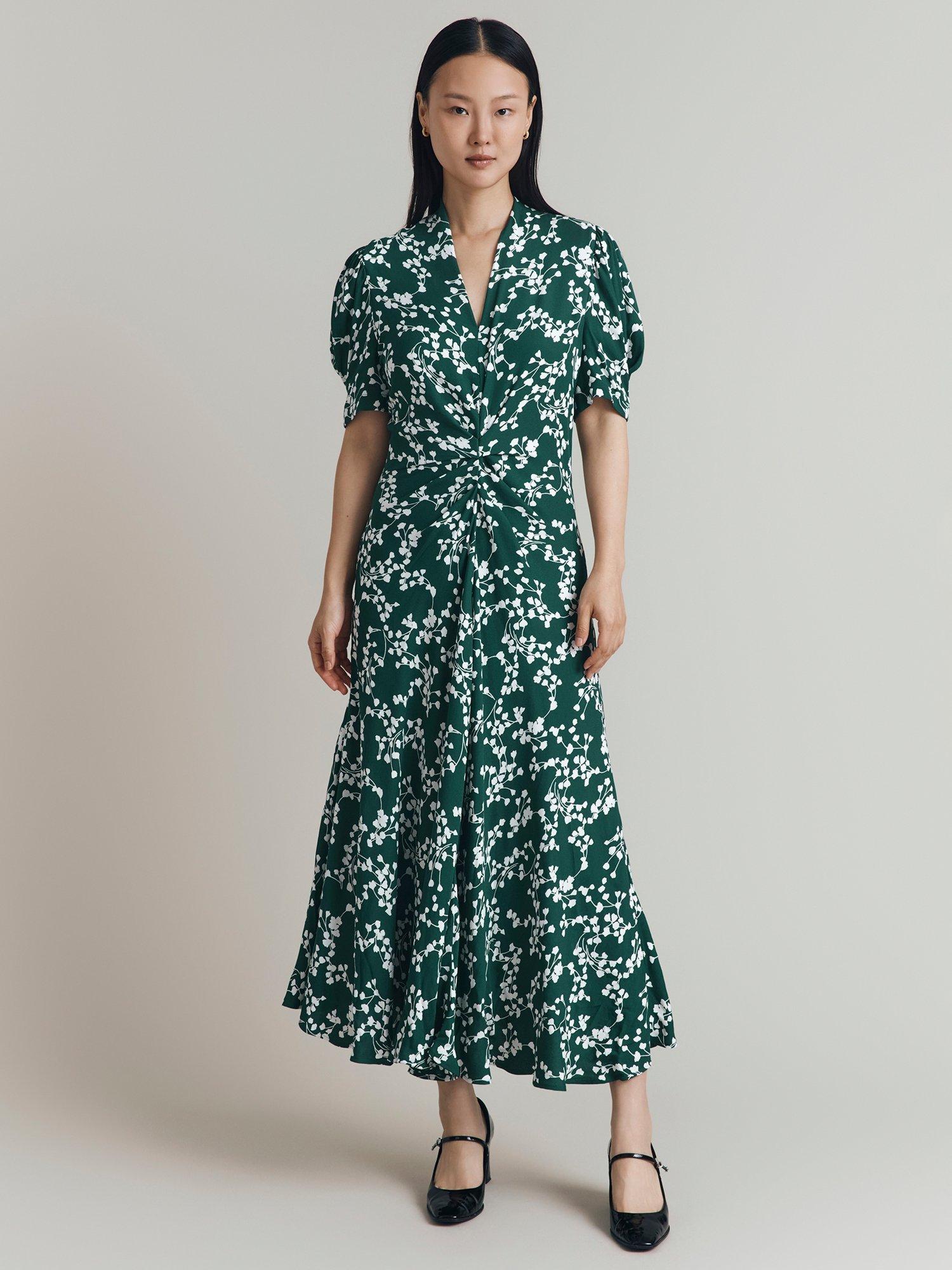 Product image 1 of 5, which shows Ghost Capri Floral Puff Sleeve Dress, Green, XS