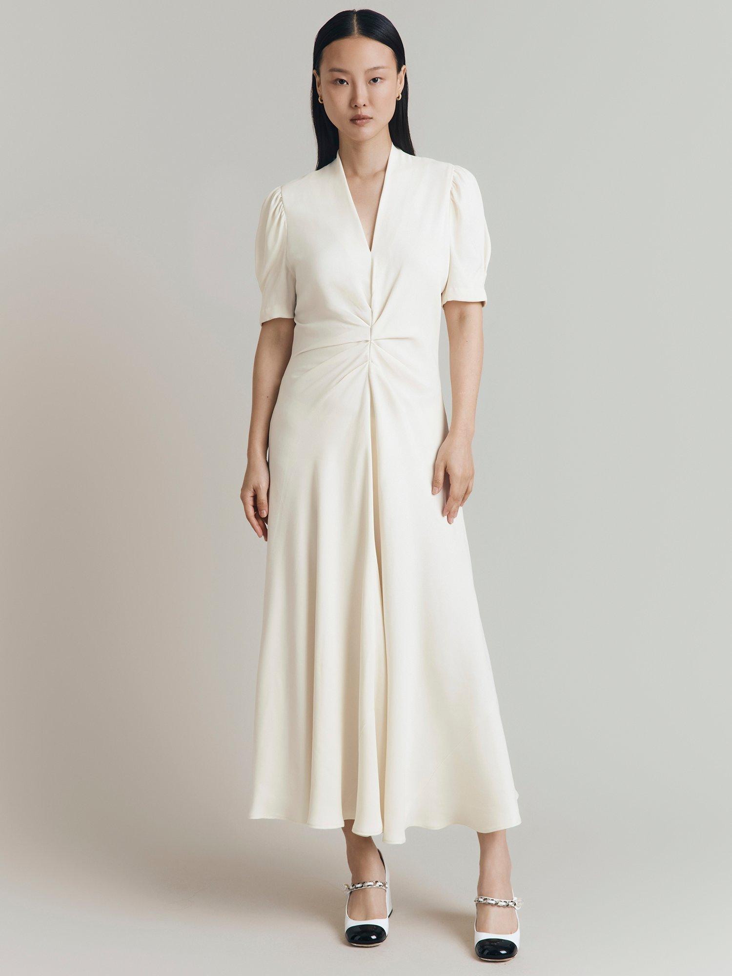 Product image 1 of 5, which shows Ghost Capri Puff Sleeve Midi Dress, Cloud Dancer, XS