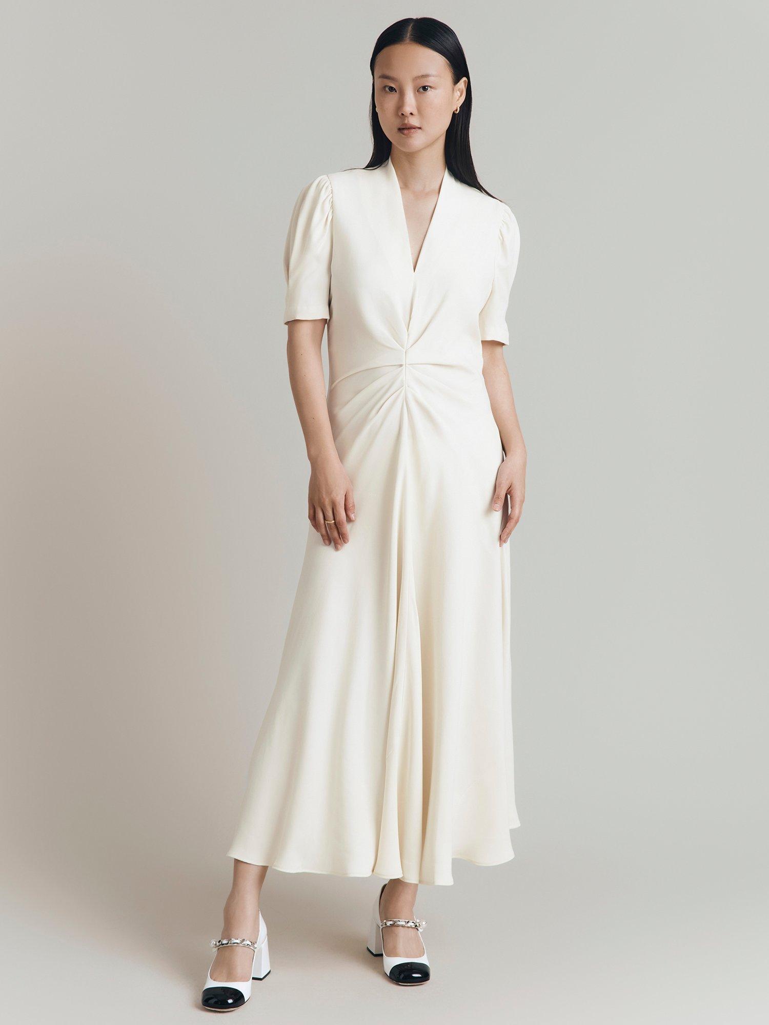 Product image 2 of 5, which shows Ghost Capri Puff Sleeve Midi Dress, Cloud Dancer, XS