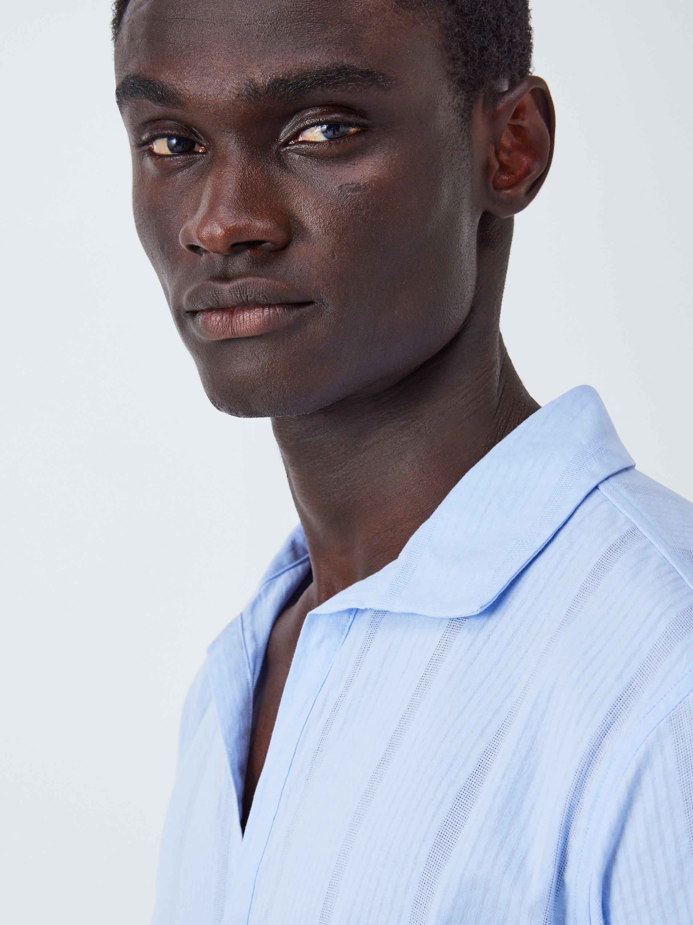Product image 5 of 6, which shows John Lewis Resort Collection Seersucker Skipper Collar Long Sleeve Shirt, Light Blue, S