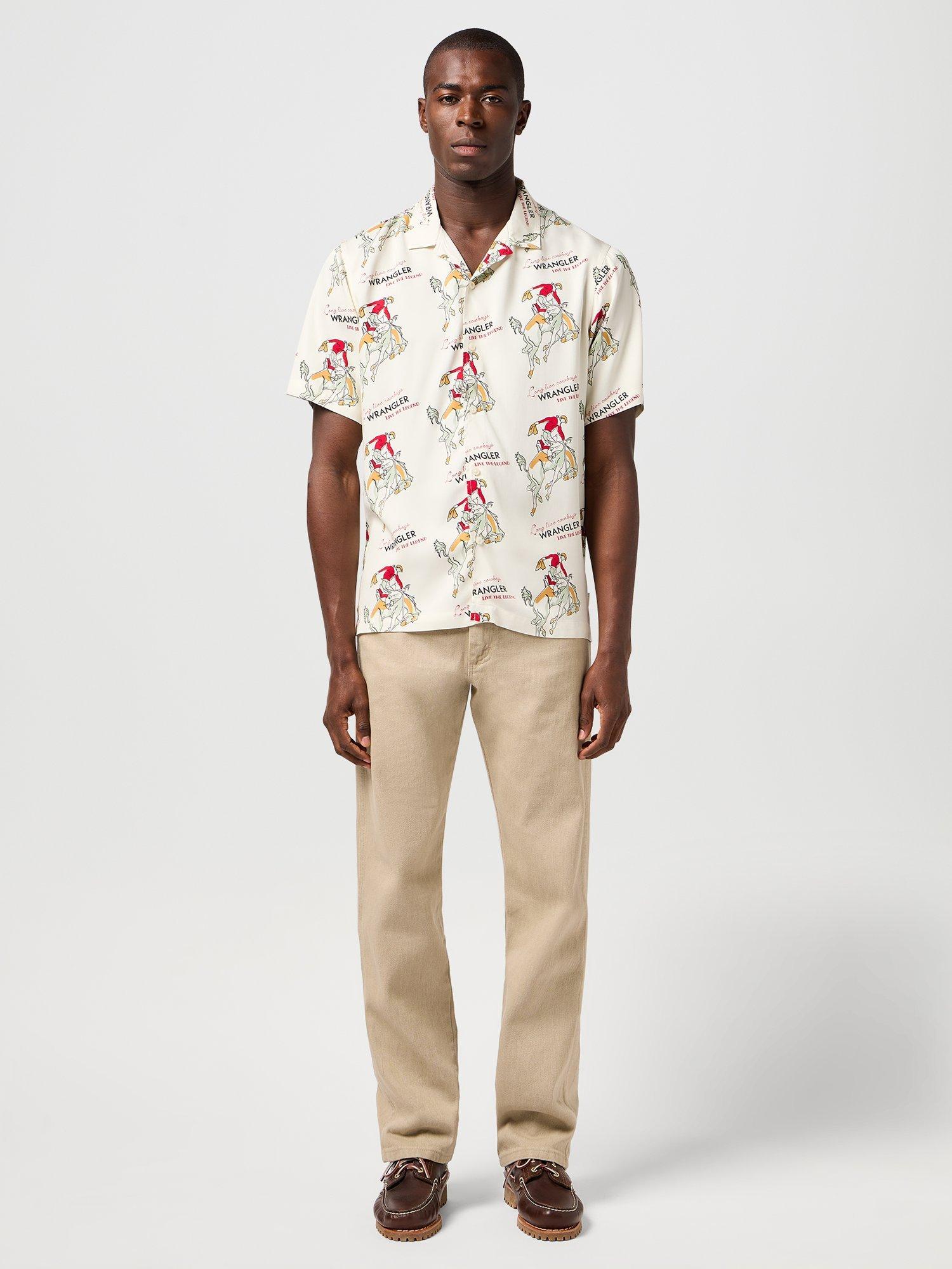 Product image 1 of 7, which shows Wrangler Resort Short Sleeve Cowboy Print Shirt, Antique White, M