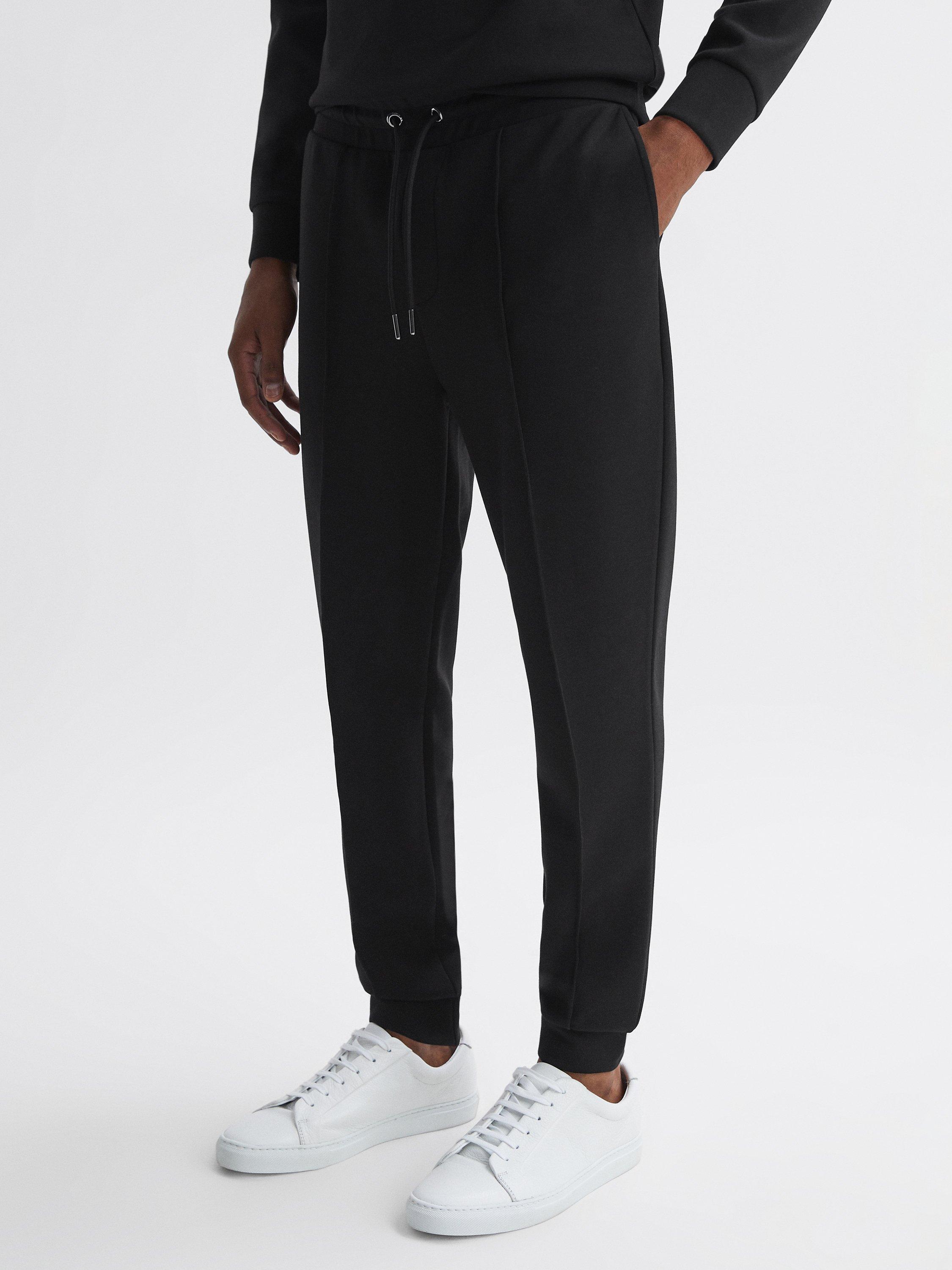 Product image 1 of 5, which shows Reiss Premier Jogger Trousers, Black, XS