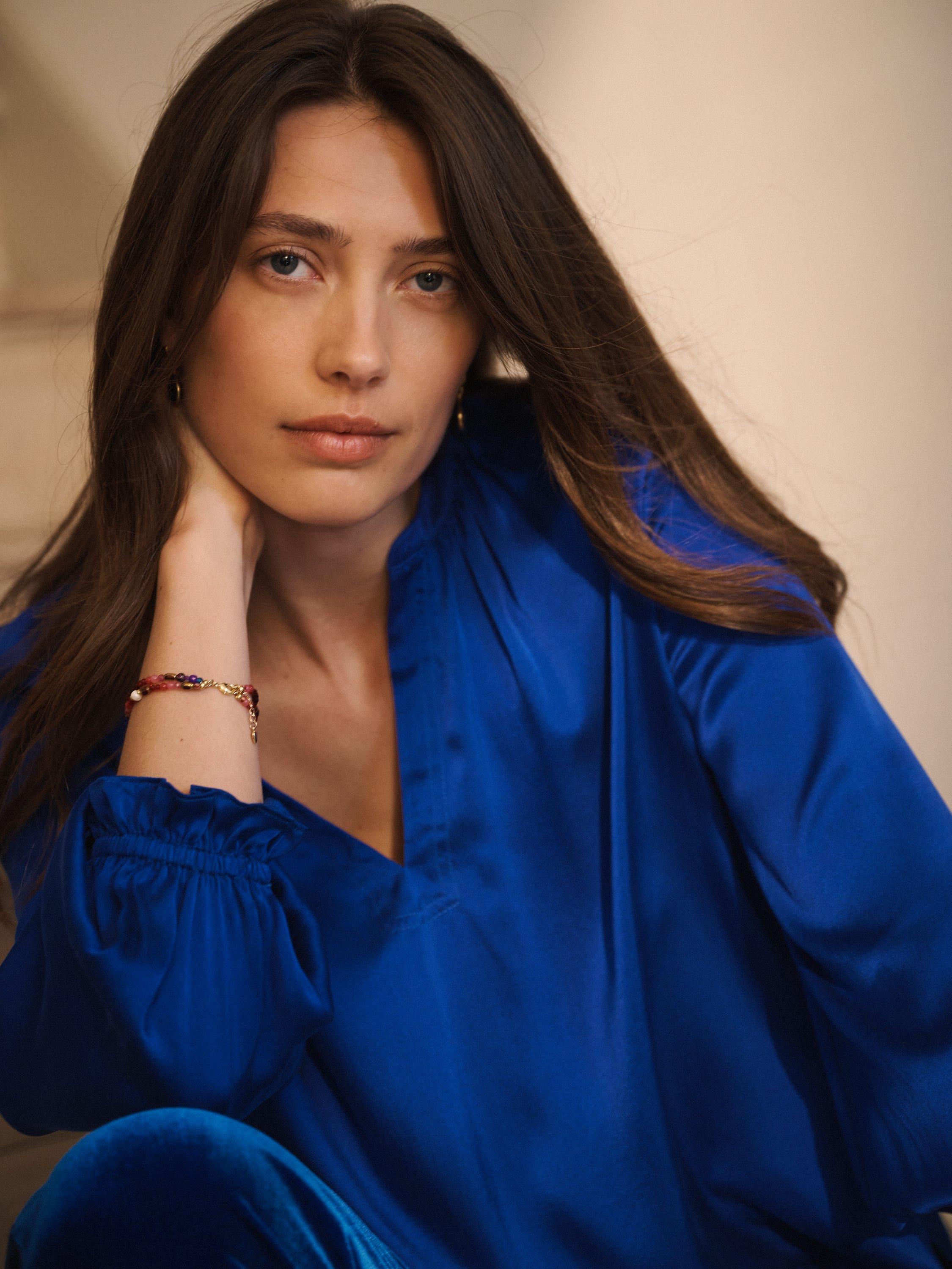 Product image 3 of 8, which shows NRBY Nikki Silk Satin Top, Lapis Blue, M