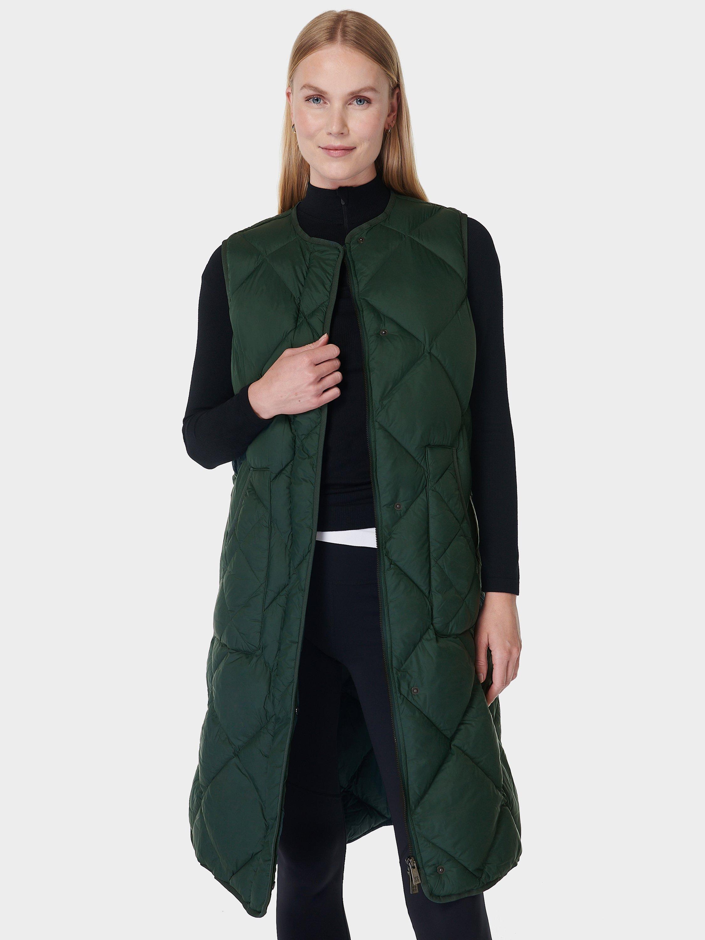 Product image 1 of 6, which shows Sweaty Betty Downtown Longline Quilted Gilet, Trek Green, L