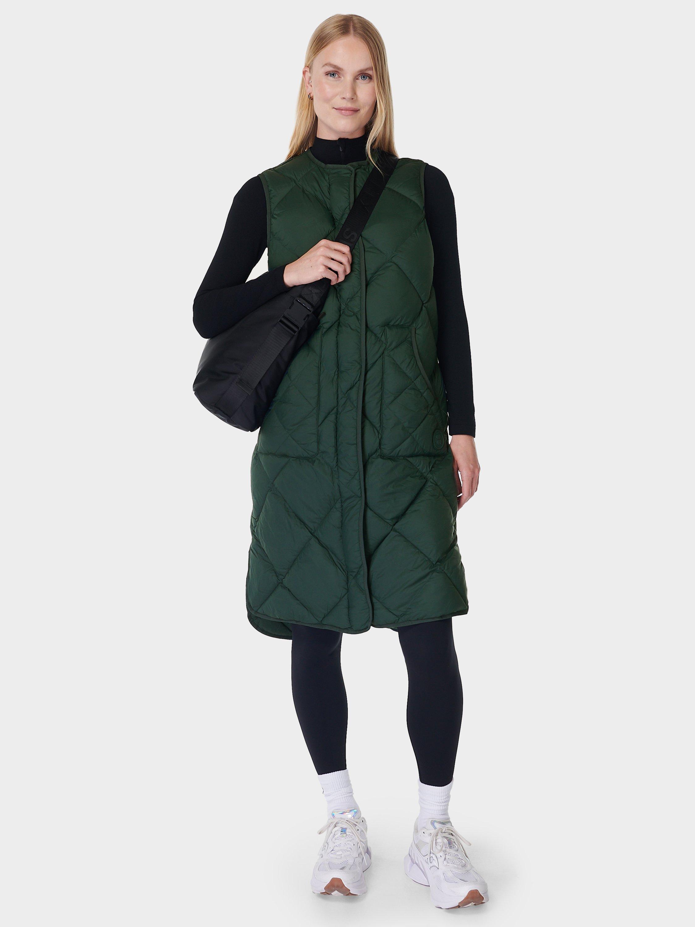 Product image 3 of 6, which shows Sweaty Betty Downtown Longline Quilted Gilet, Trek Green, L