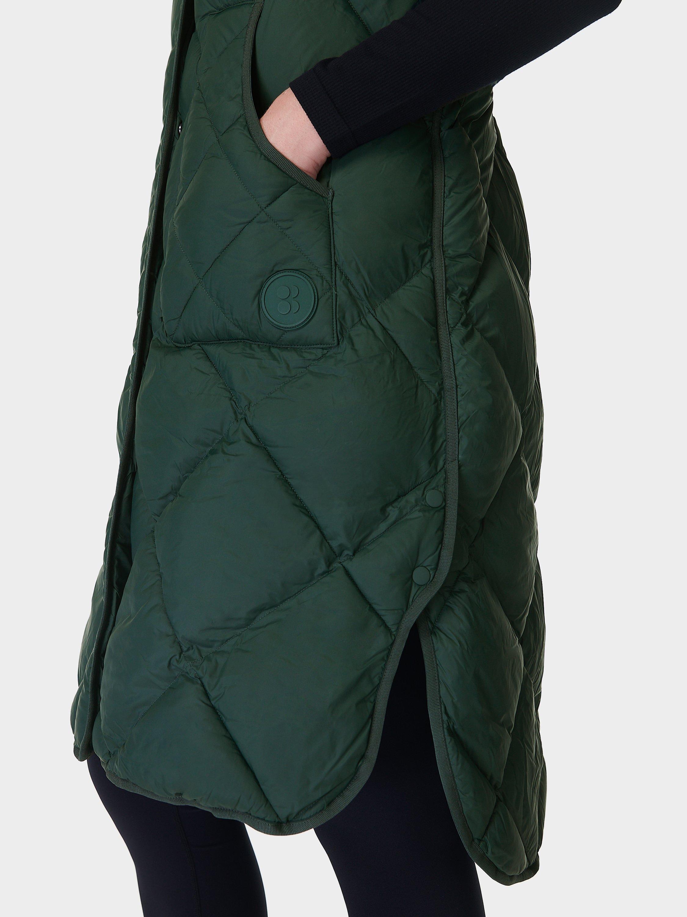 Product image 5 of 6, which shows Sweaty Betty Downtown Longline Quilted Gilet, Trek Green, L