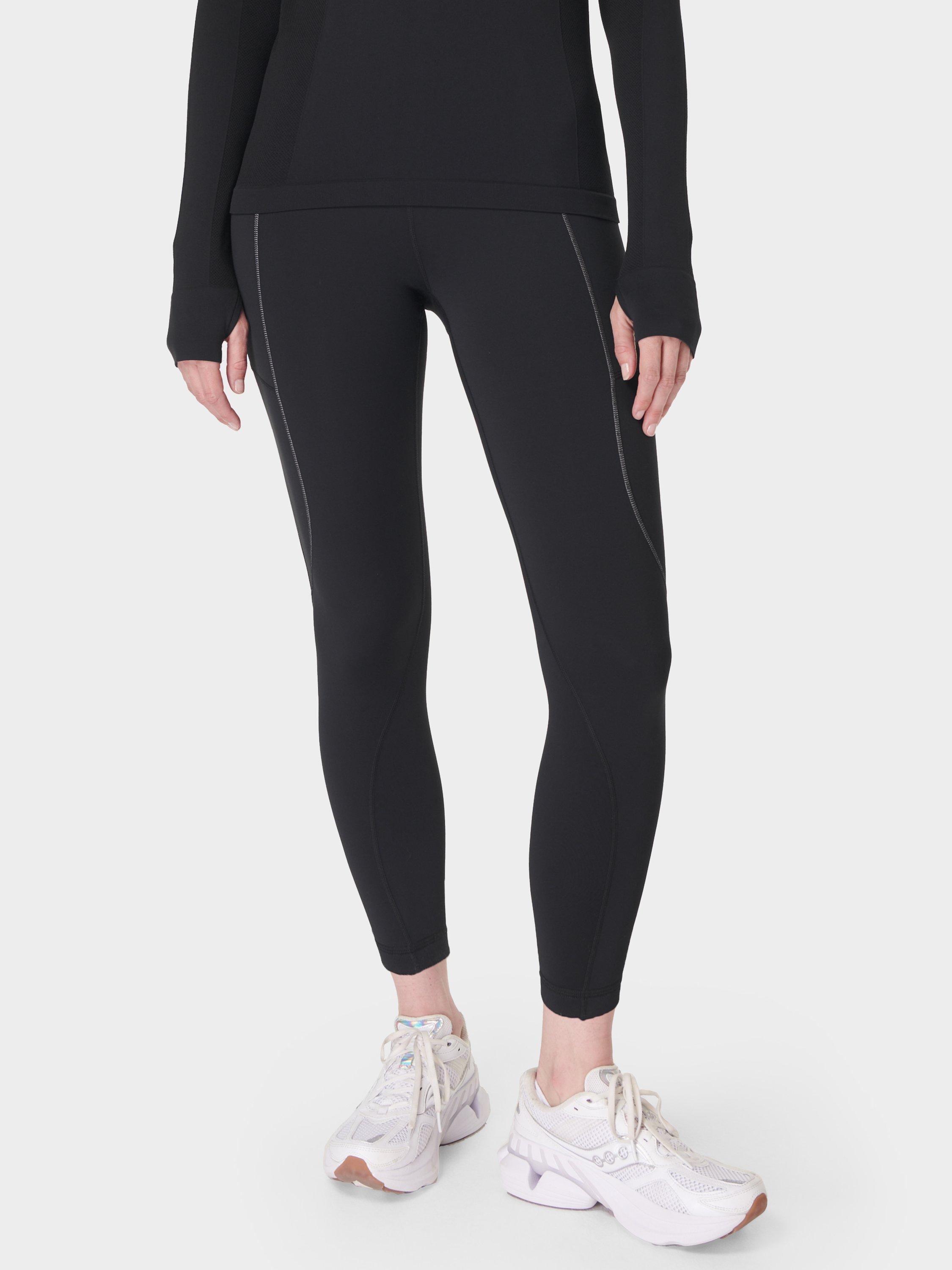 Product image 1 of 8, which shows Sweaty Betty Winter Run 7/8 Leggings, Black, S