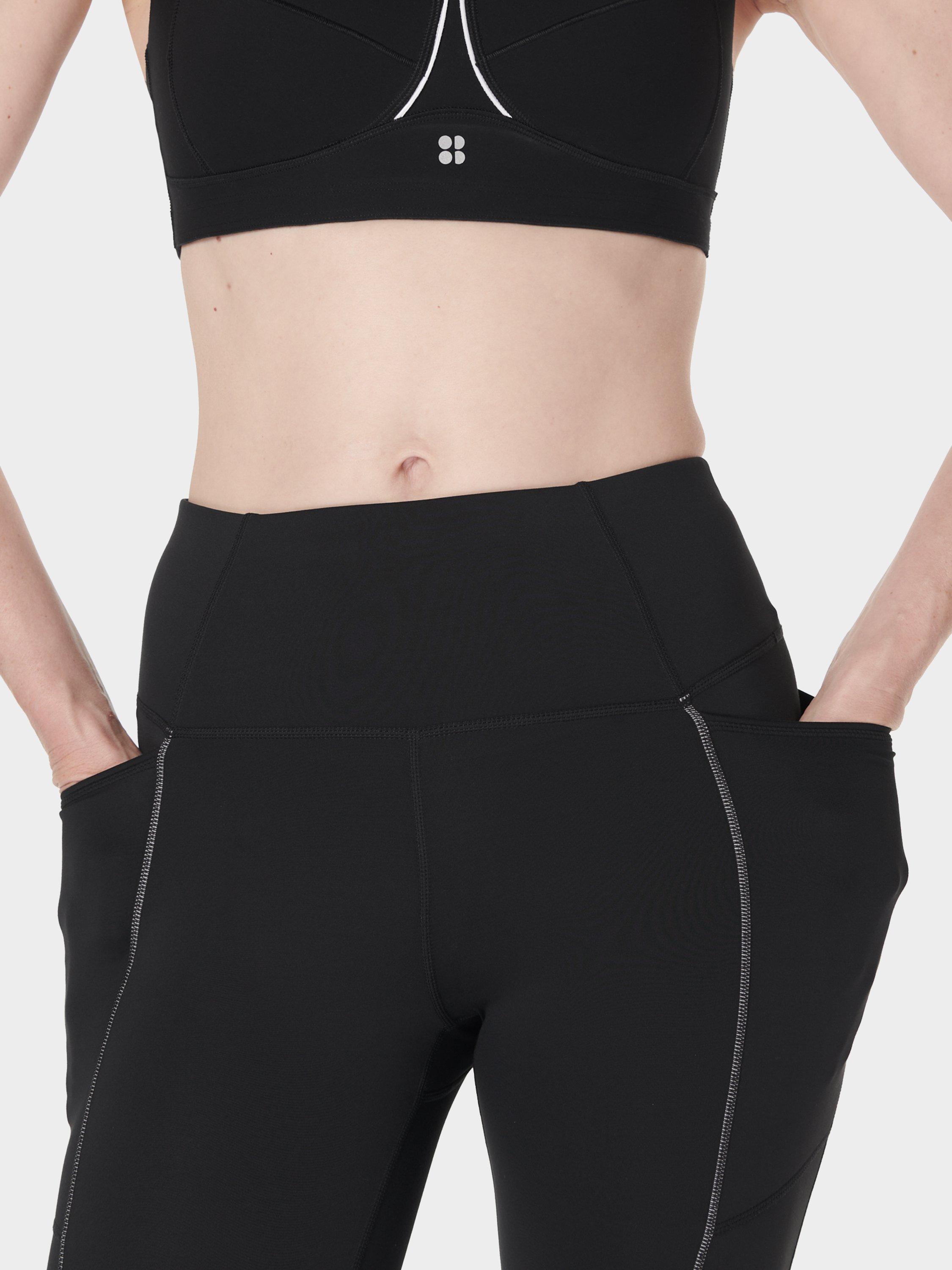 Product image 7 of 8, which shows Sweaty Betty Winter Run 7/8 Leggings, Black, S