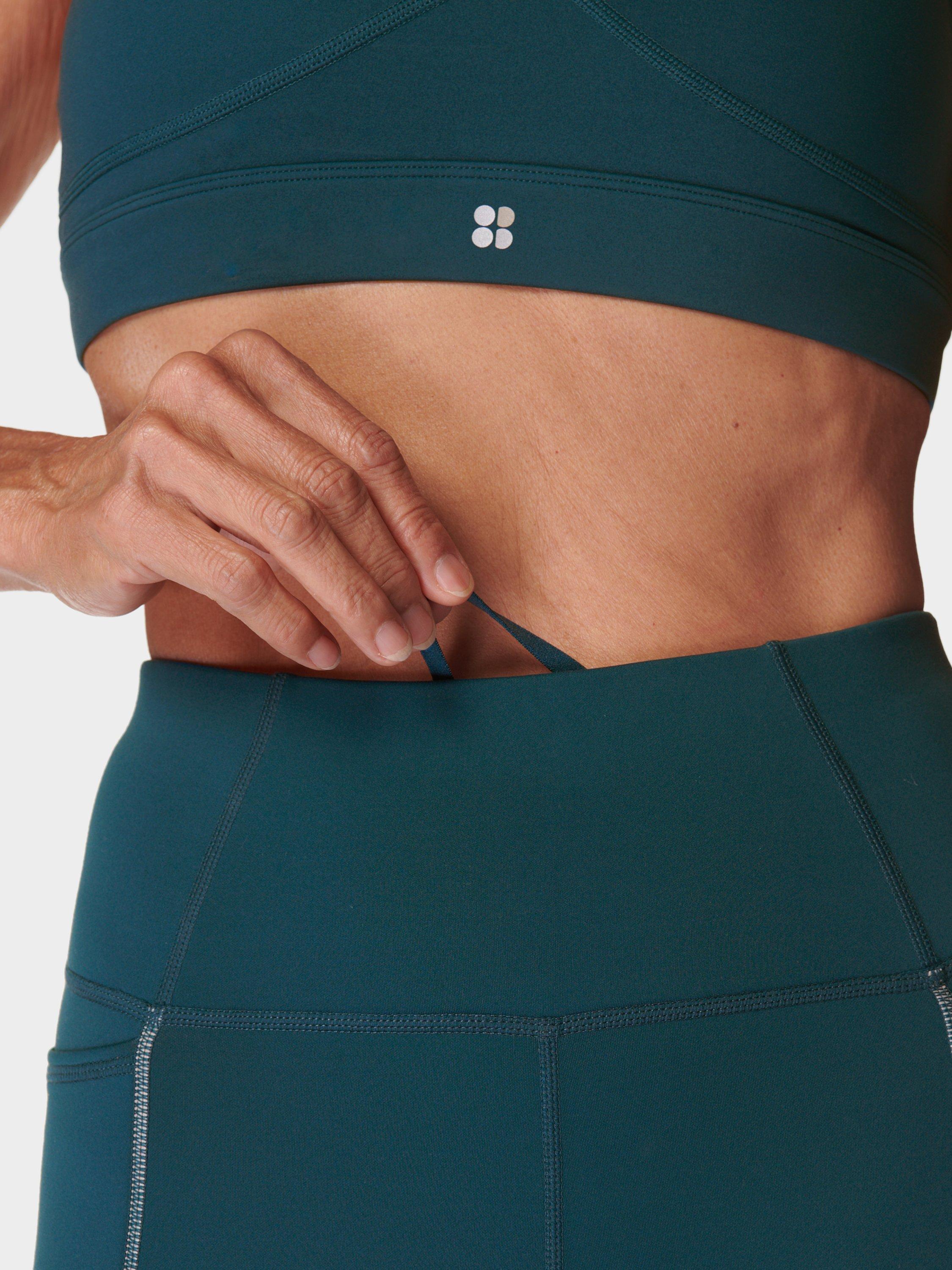 Product image 4 of 8, which shows Sweaty Betty Winter Run Leggings, Deep Green, XS