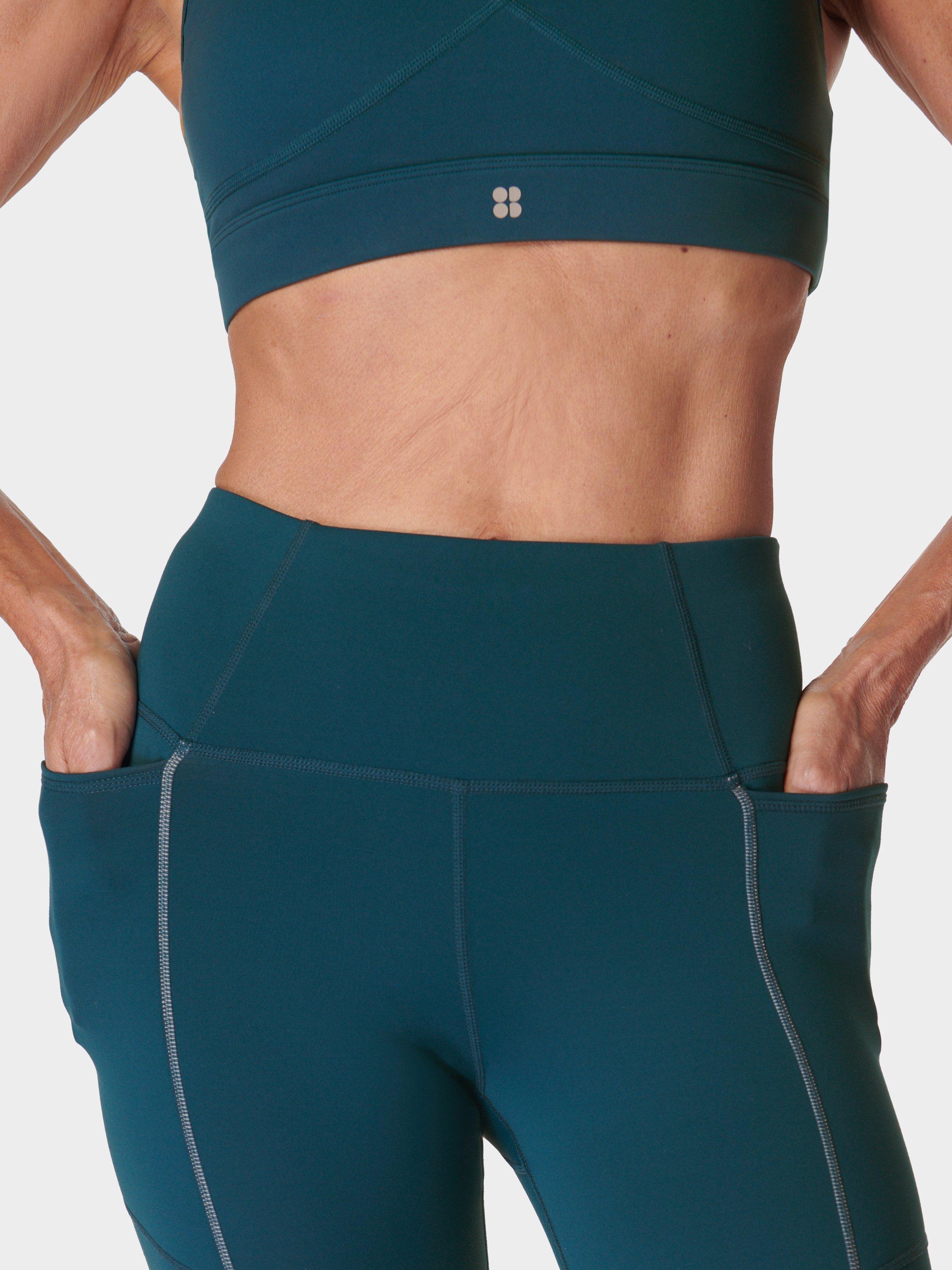Product image 7 of 8, which shows Sweaty Betty Winter Run Leggings, Deep Green, XS