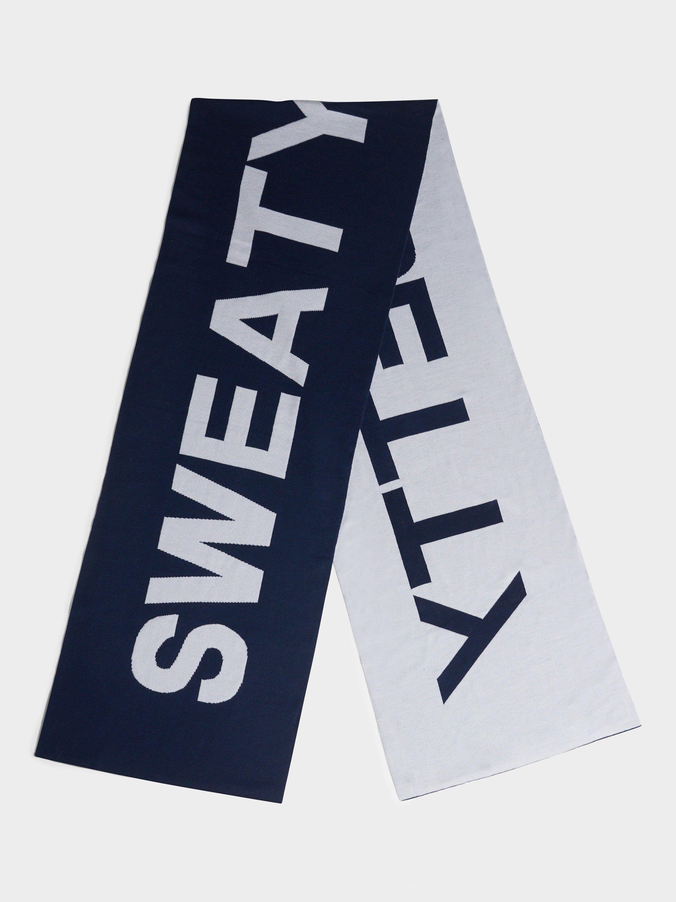 Product image 1 of 4, which shows Sweaty Betty Jacquard Scarf, Navy Blue