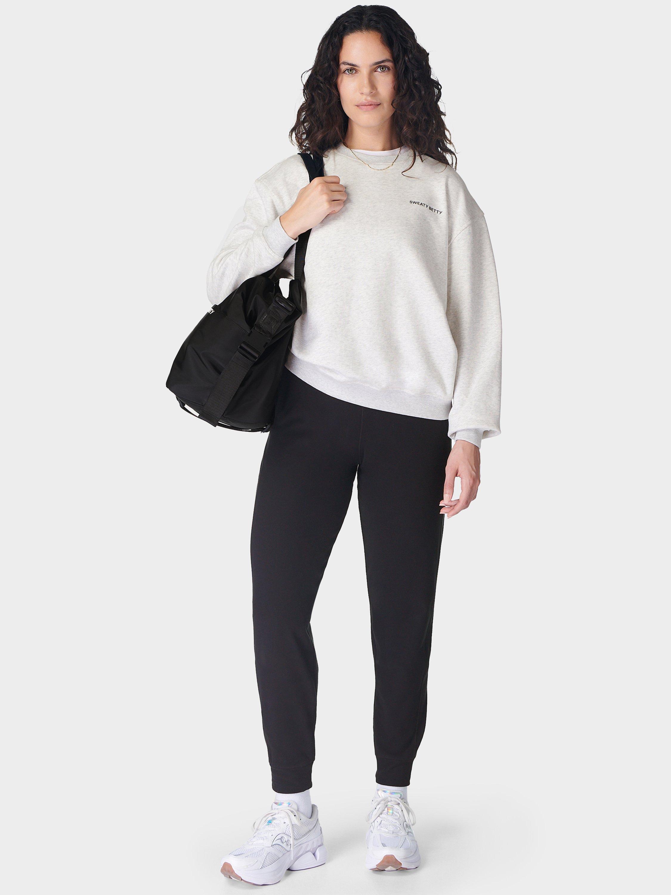 Product image 4 of 7, which shows Sweaty Betty Luxe Fleece 27" Joggers, Black, XXS