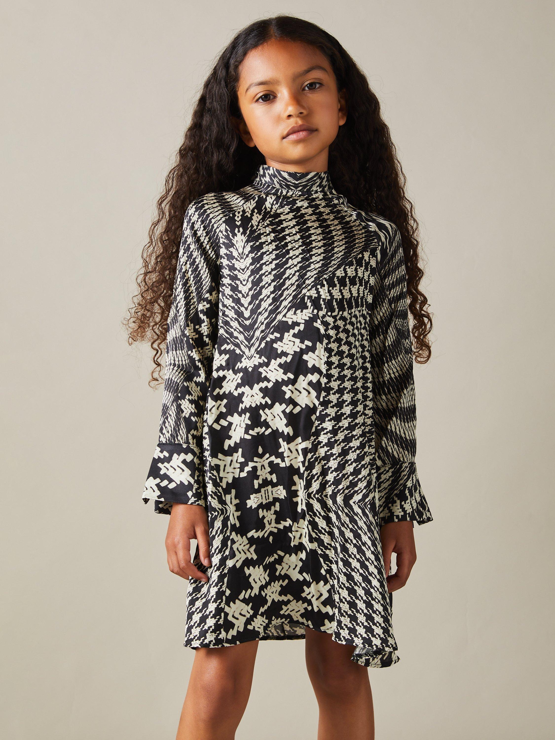 Product image 1 of 5, which shows Reiss Kids' Ester Dogtooth Mix Print Dress, Black/Cream, 4-5 years