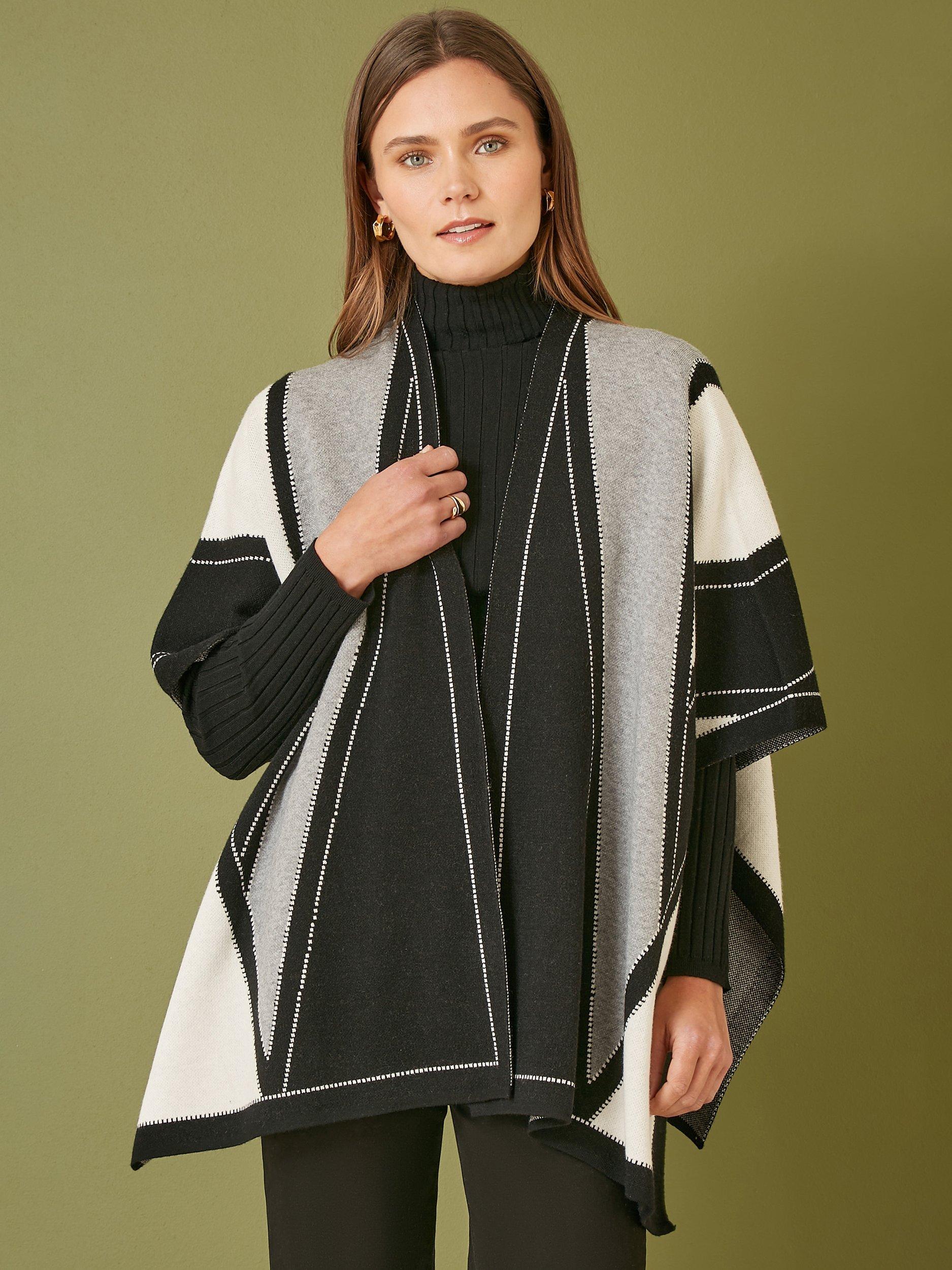 Product image 1 of 4, which shows Yumi Colour Block Knitted Cape, Black