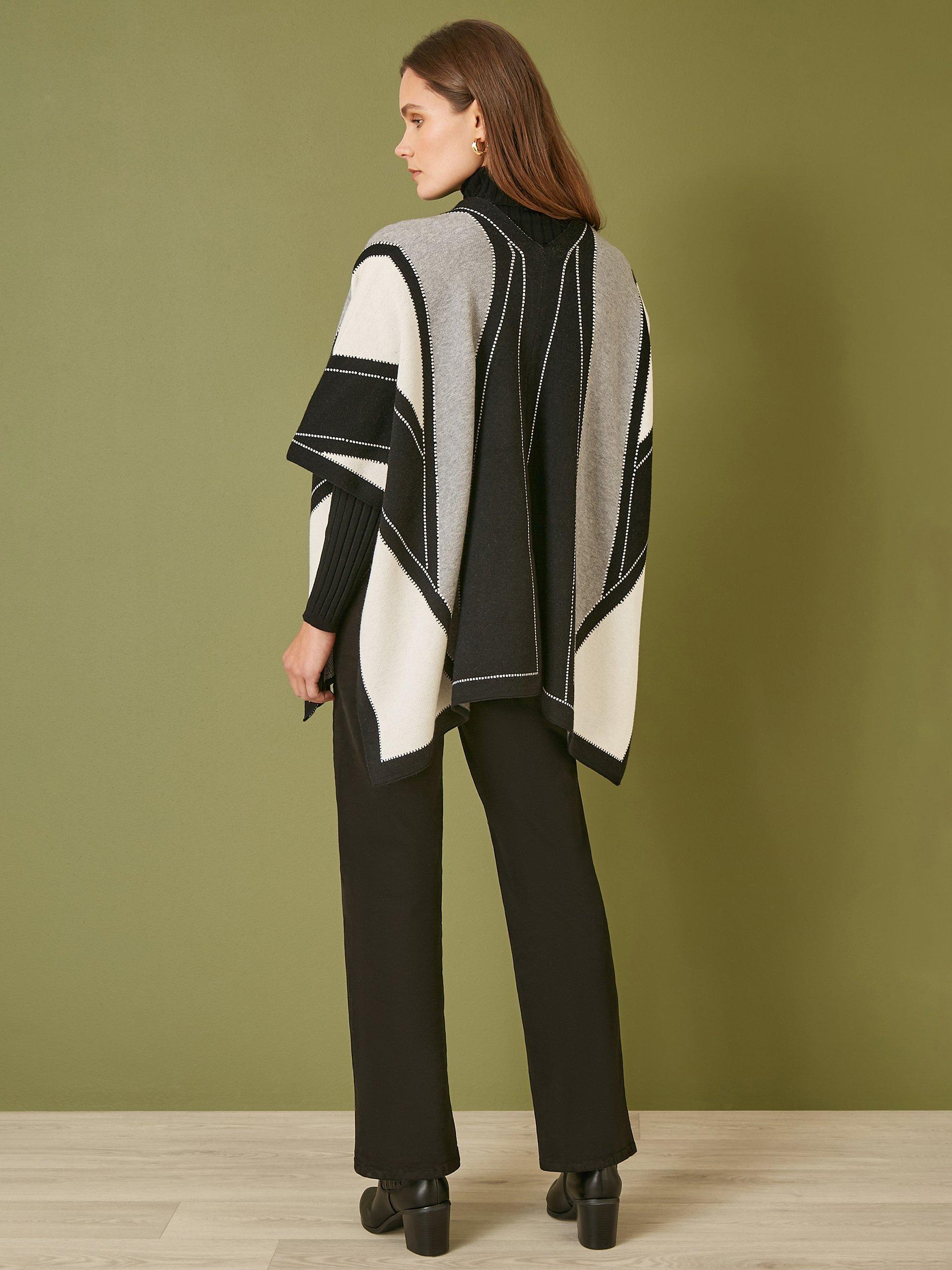 Product image 3 of 4, which shows Yumi Colour Block Knitted Cape, Black