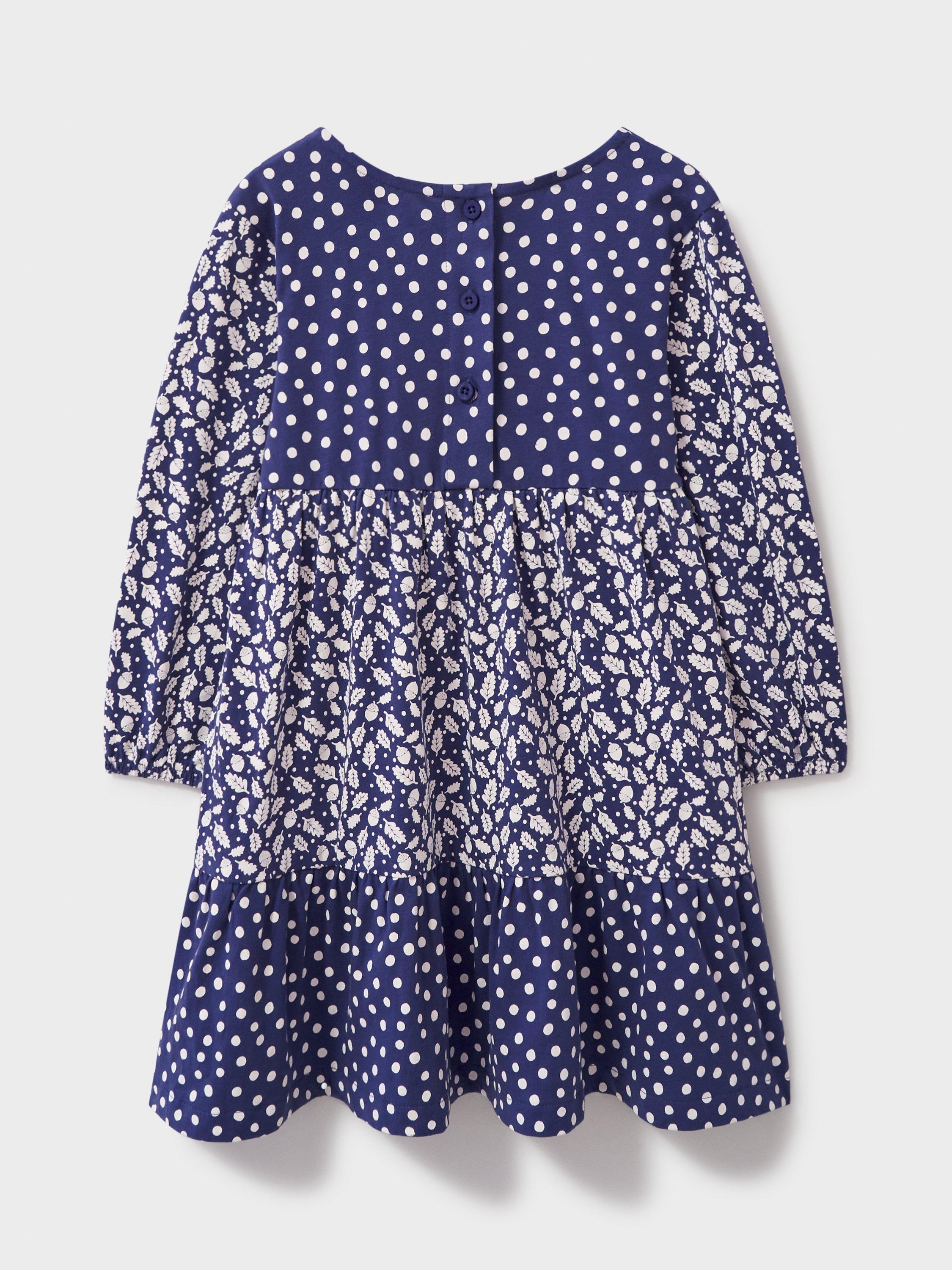 Product image 3 of 3, which shows Crew Clothing Kids' Long Sleeve Printed Tiered Jersey Dress, Navy/White, 8-9 years