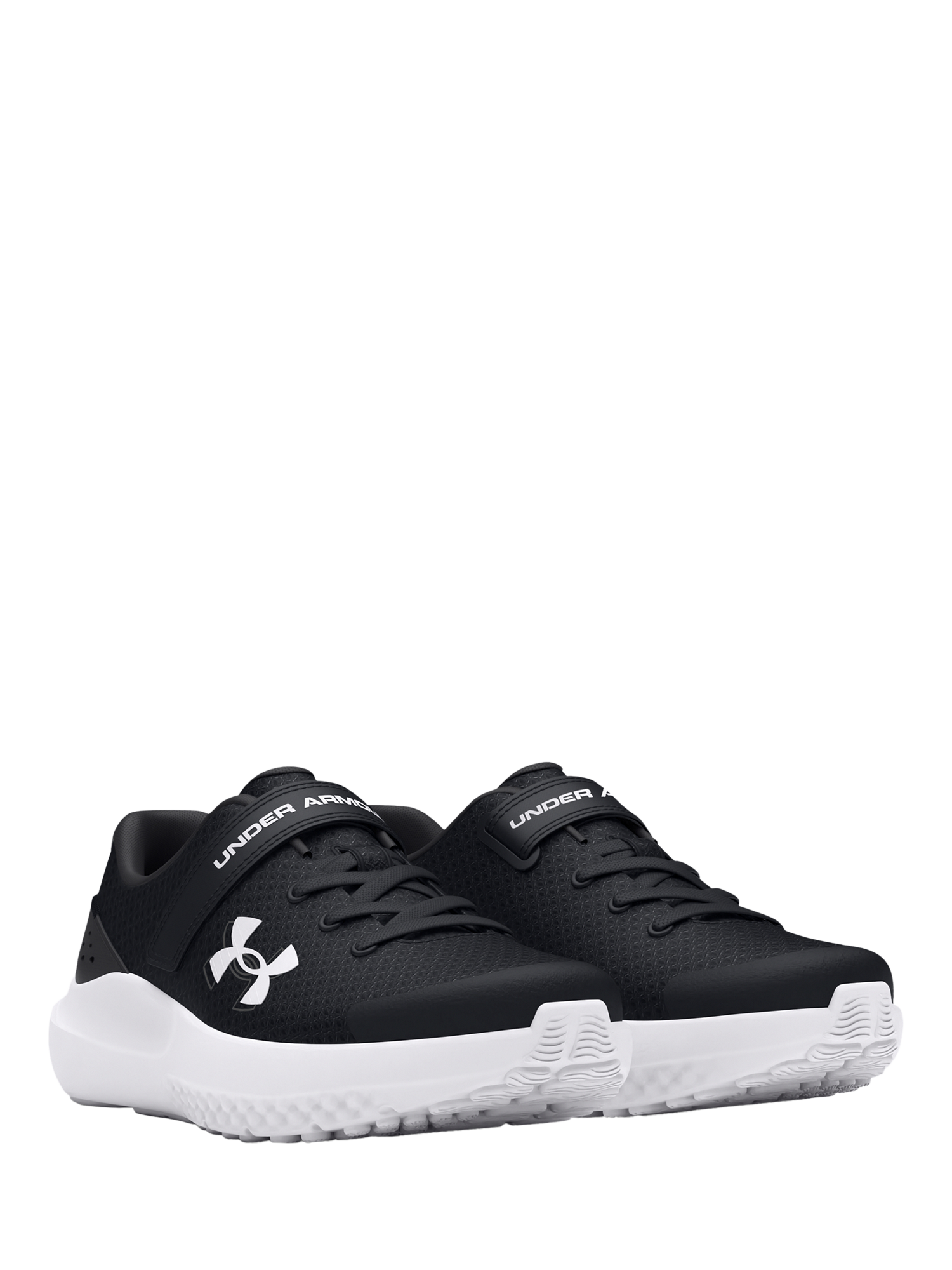 Product image 2 of 5, which shows Under Armour Kids' BPS Surge 4 AC Trainers, Black/White, 10 Jnr