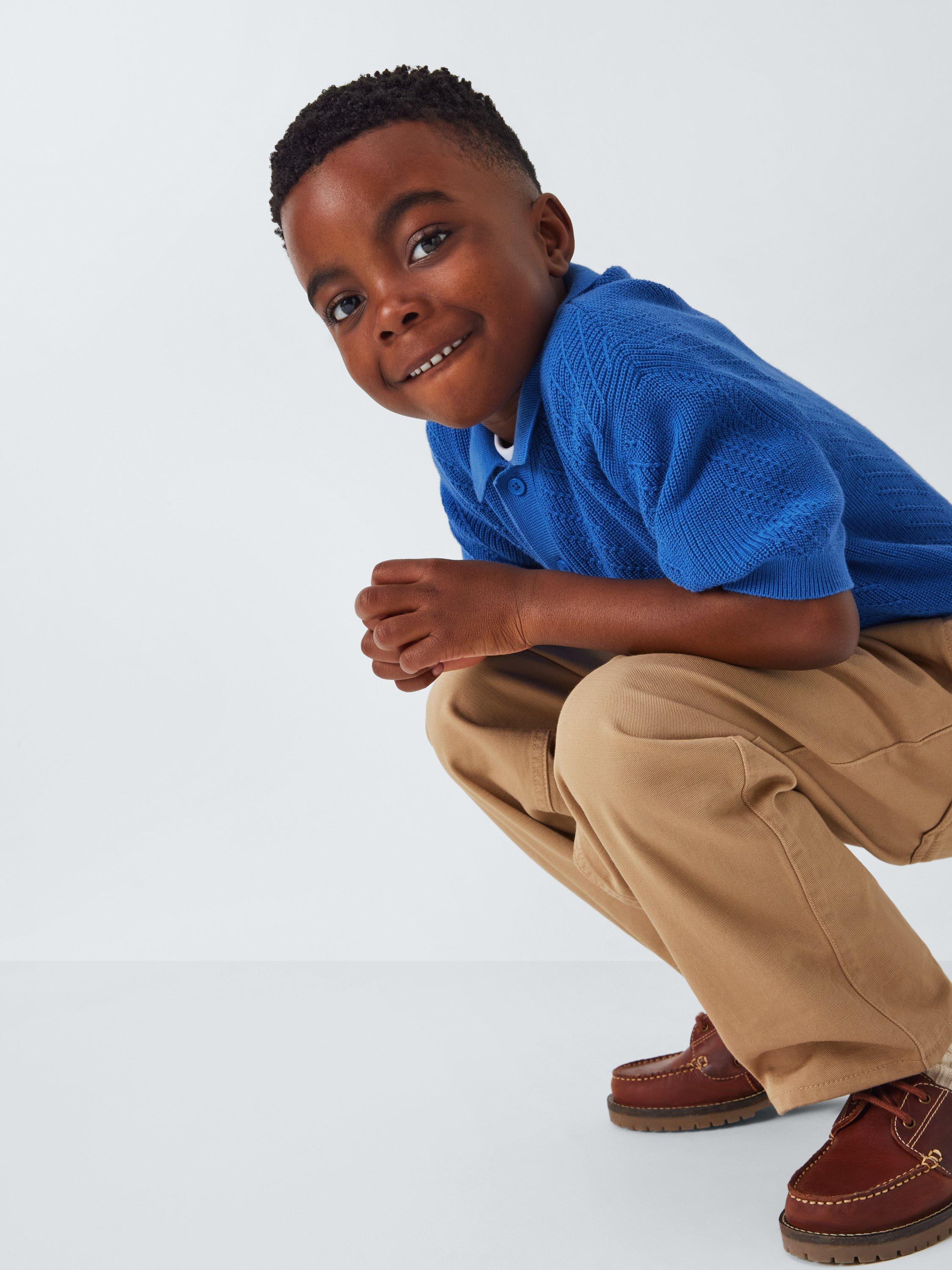 Product image 4 of 7, which shows John Lewis Kids' Short Sleeve Knit Polo Shirt, Blue, 2 years