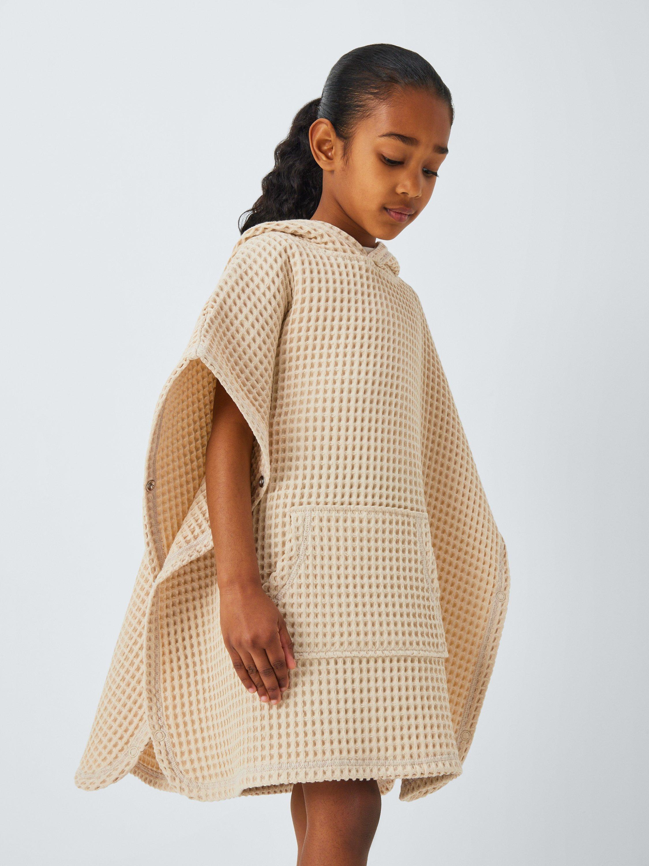 Product image 5 of 6, which shows John Lewis Kids' Waffle Towel Poncho, Cream, 3-4 years