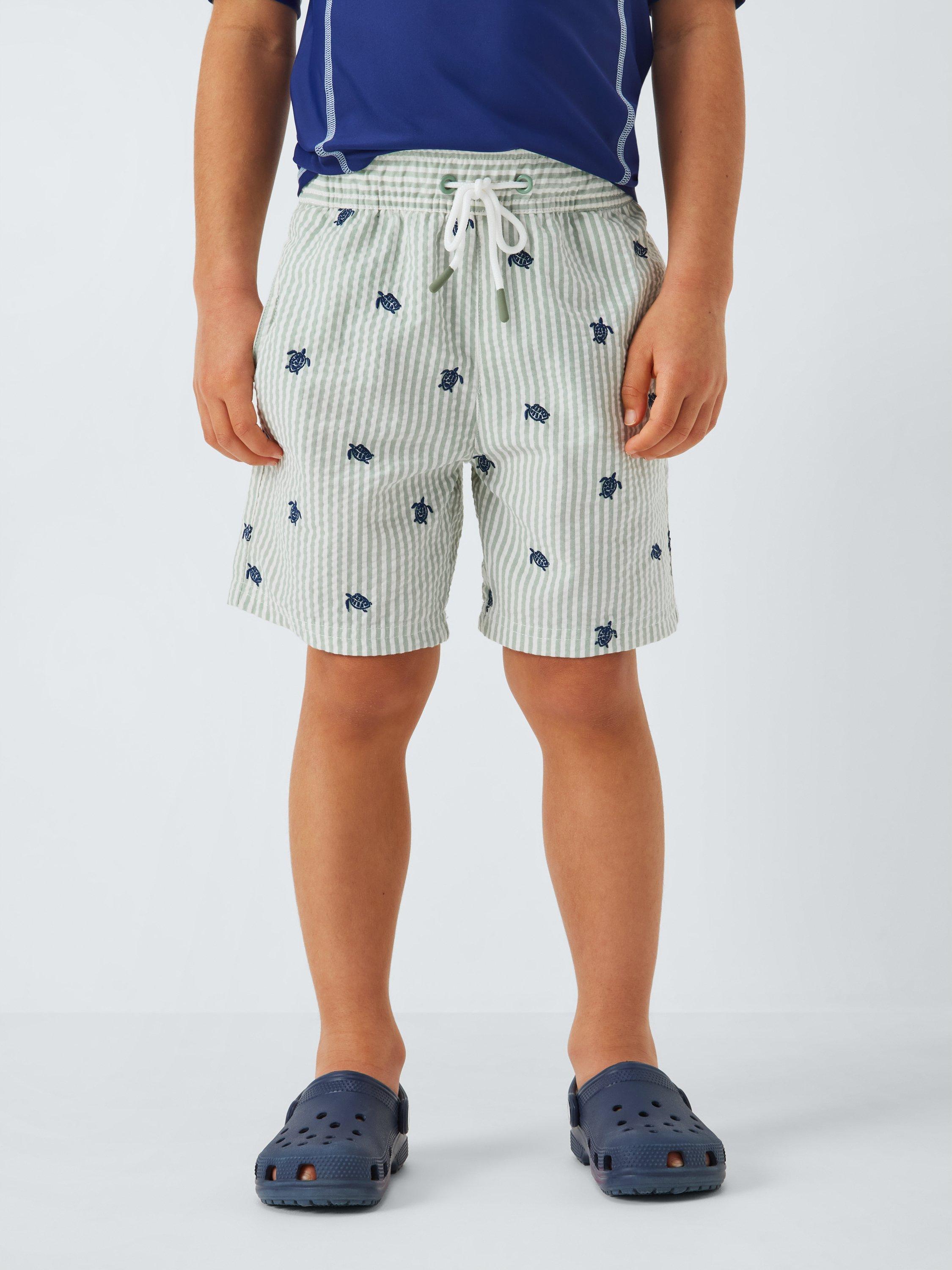 Product image 1 of 7, which shows John Lewis Kids' Turtle Swim Shorts, Green, 2 years