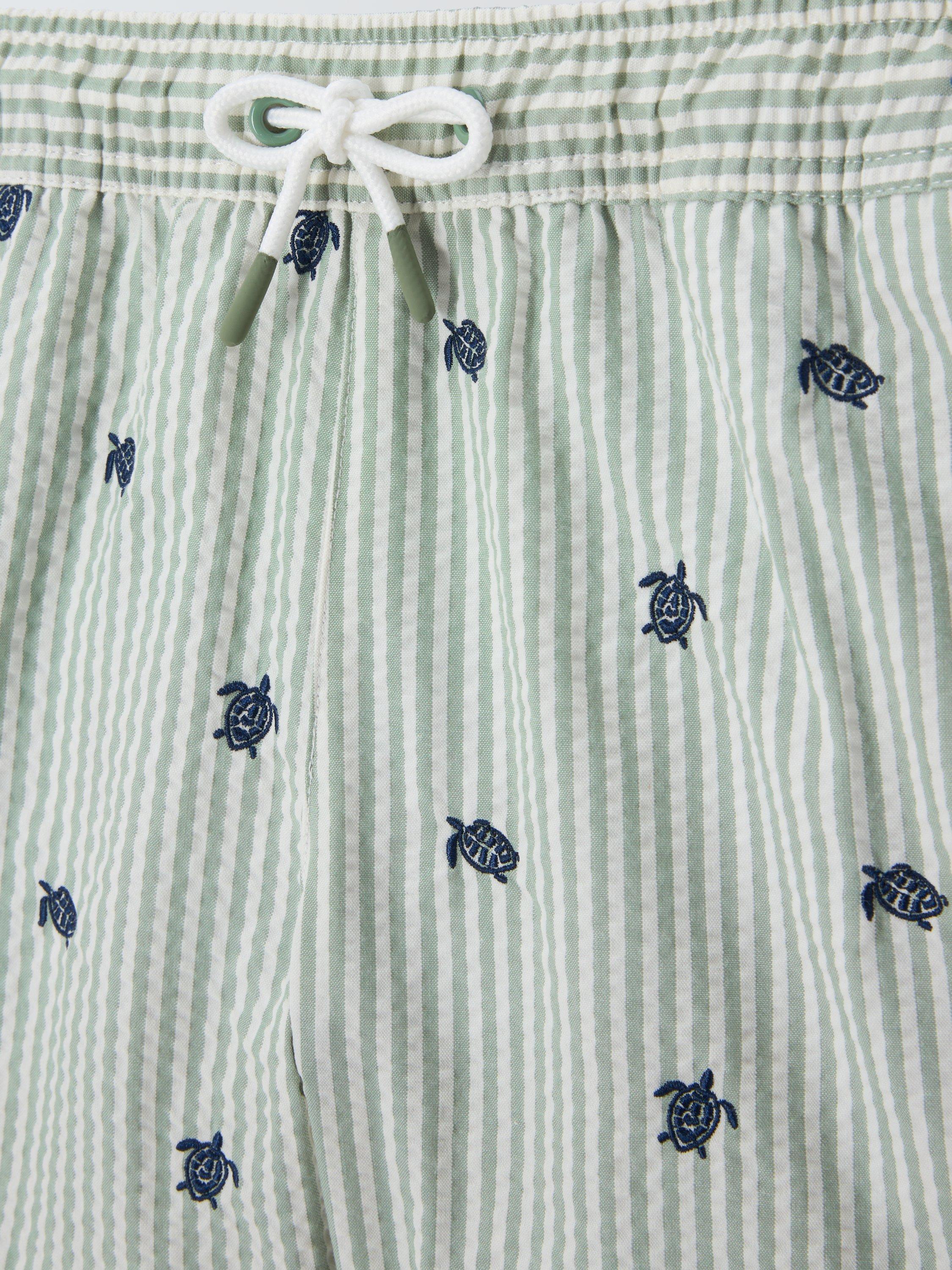 Product image 6 of 7, which shows John Lewis Kids' Turtle Swim Shorts, Green, 2 years