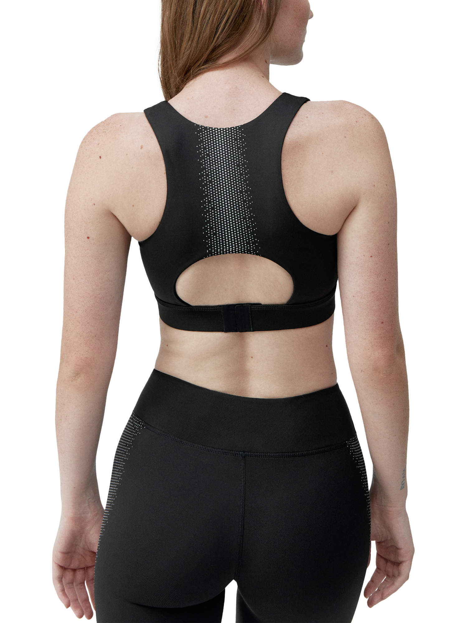 Product image 2 of 5, which shows Born Living Yoga Night Sports Bra, Black, L