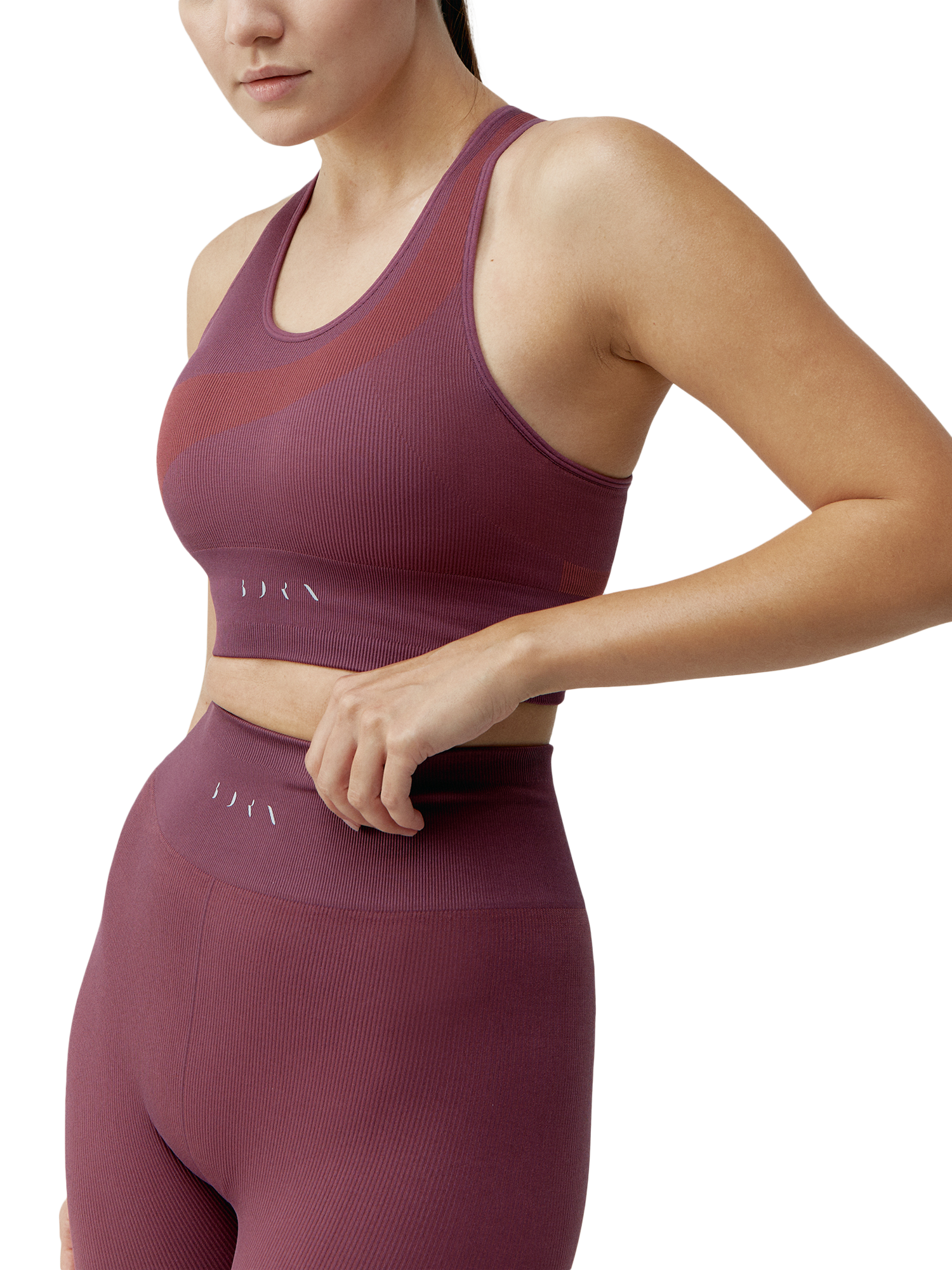 Product image 1 of 6, which shows Born Living Yoga Aila Sports Bra, Beet Plant, S