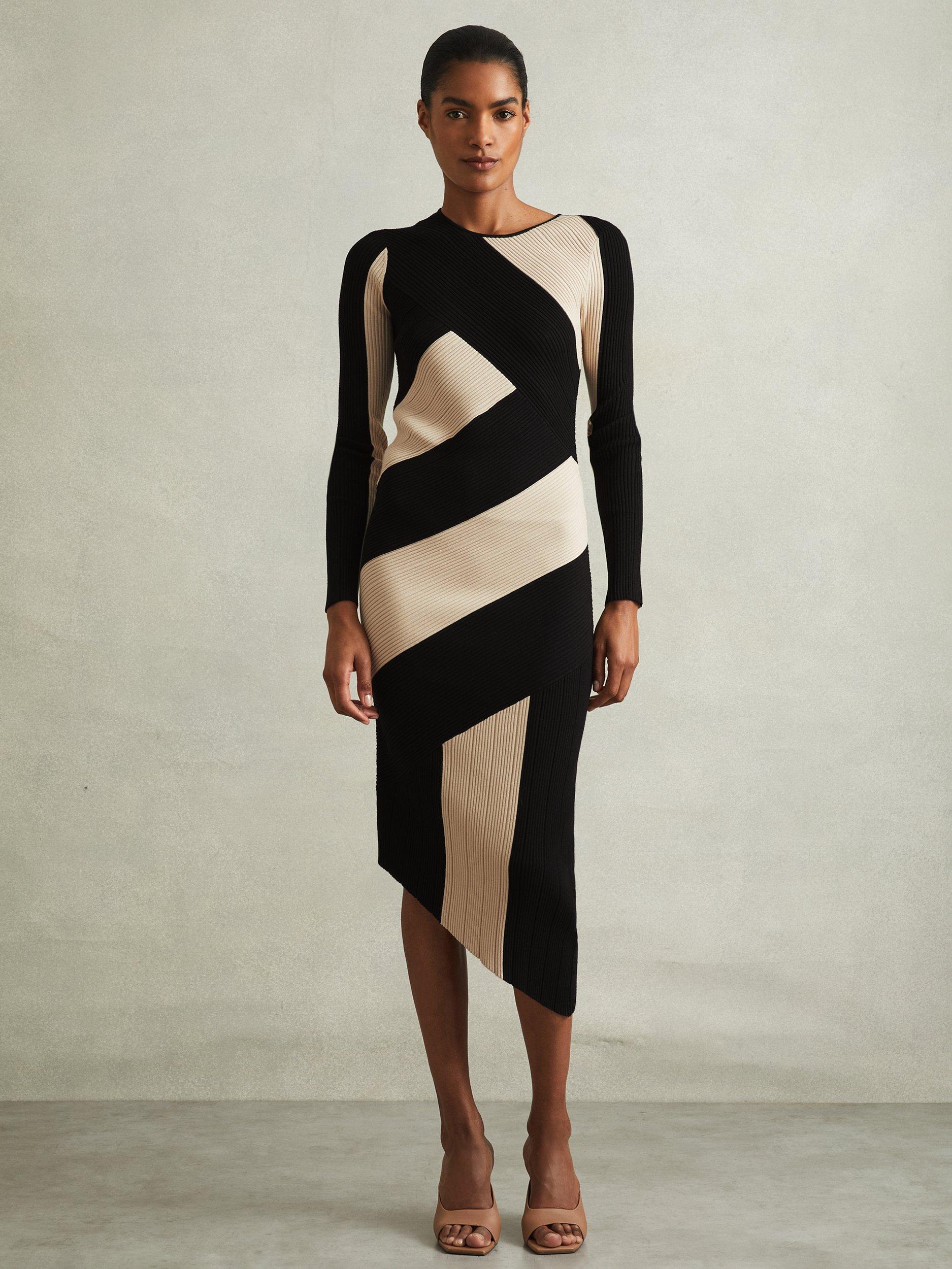Product image 2 of 5, which shows Reiss Petite Jem Knitted Colourblock Asymmetric Midi Dress, Black/Camel, XS