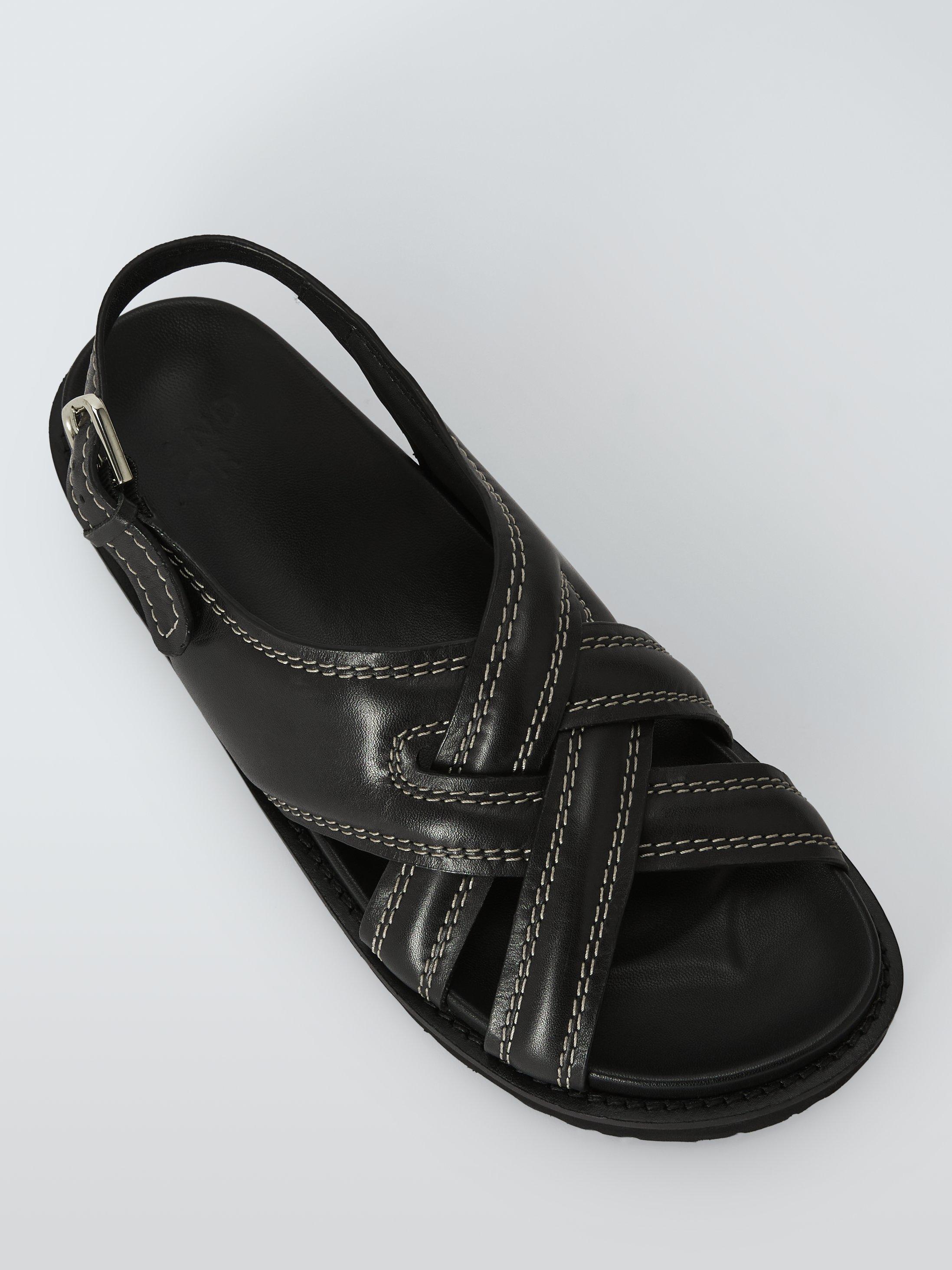 Product image 4 of 5, which shows AND/OR Laura Leather Padded Cross Strap Footbed Sandals, Black, 4