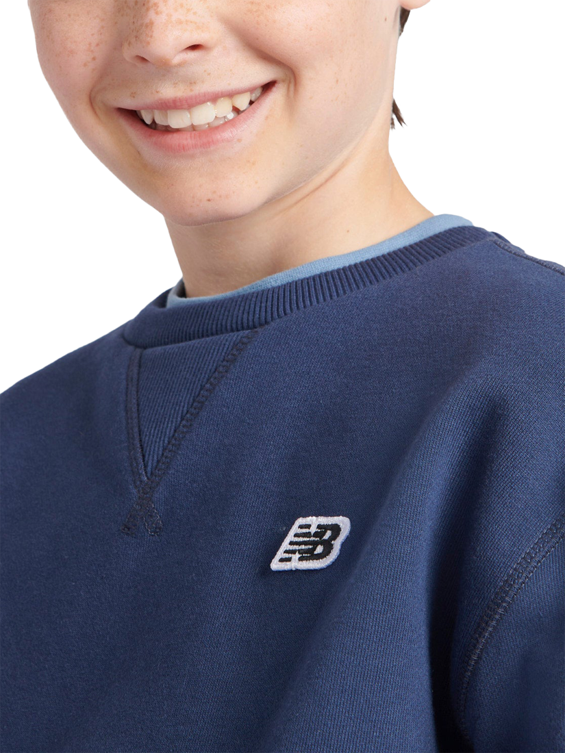 Product image 4 of 10, which shows New Balance Kids' Premium Crew Neck Sweatshirt, Navy, 7-8 years