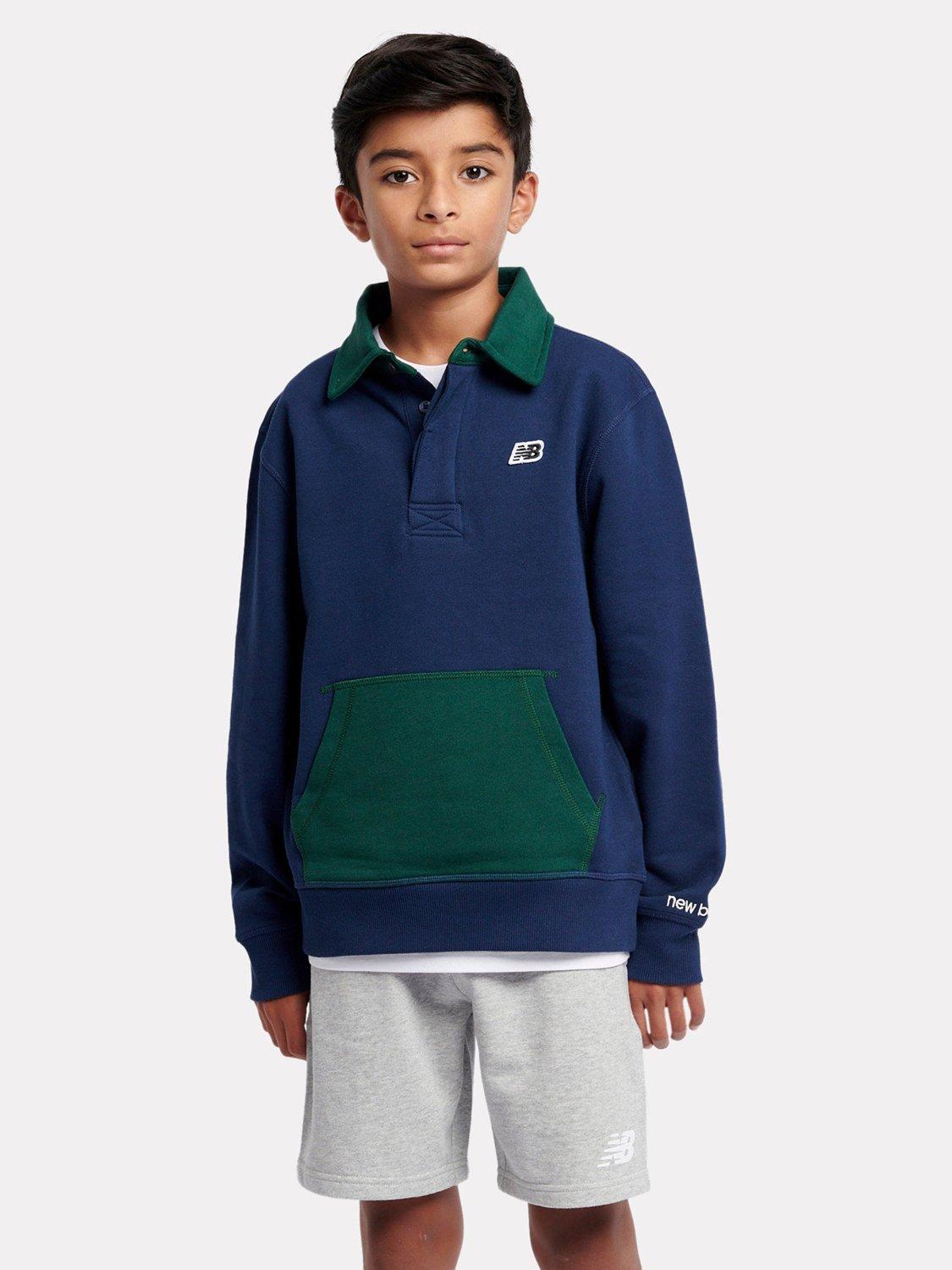 Product image 7 of 10, which shows New Balance Kids' Premium Rugby Shirt, Navy, 7-8 years