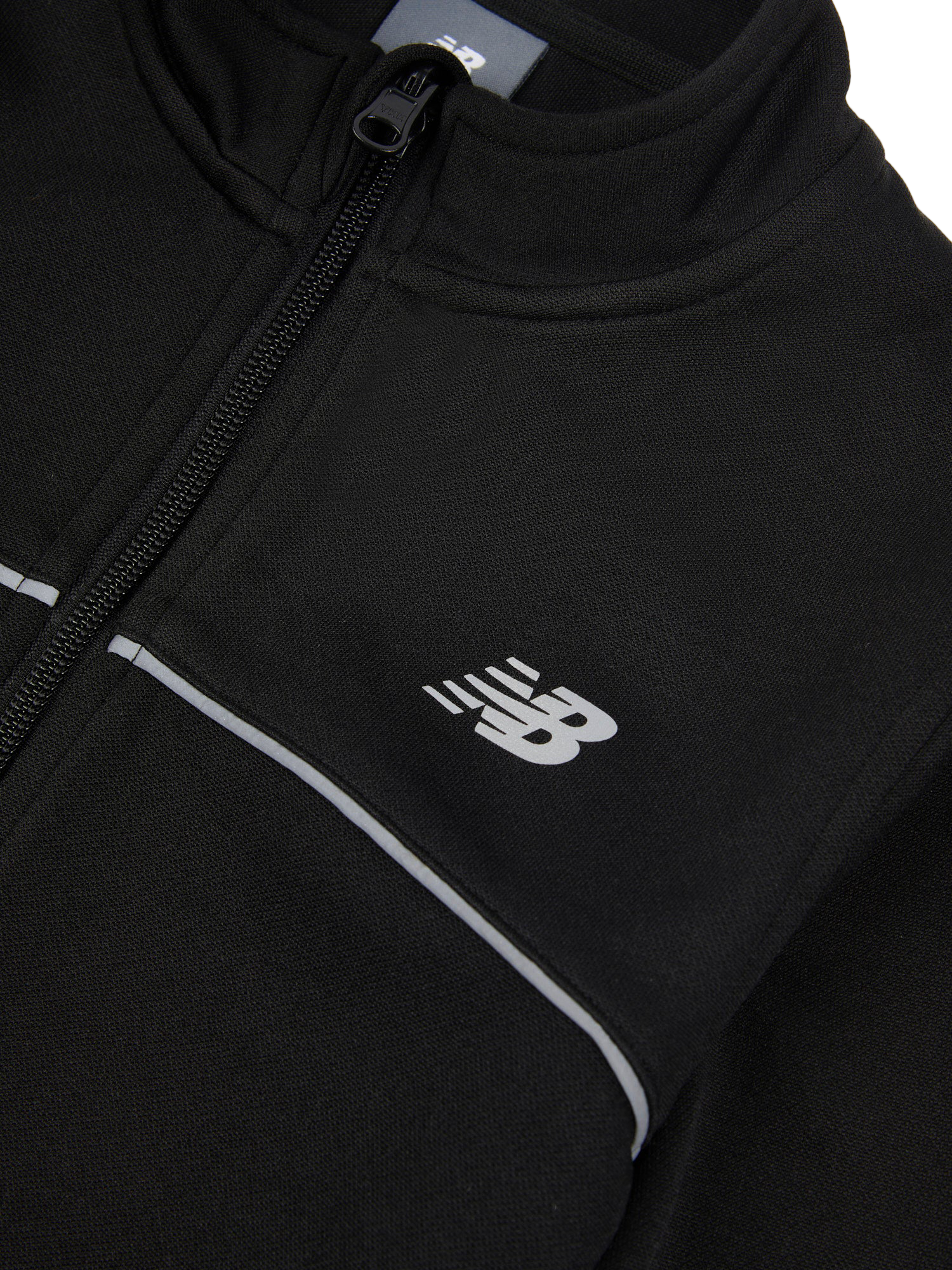 Product image 9 of 9, which shows New Balance Kids' Tricot Zip Up Funnel Neck Jacket, Caviar, 7-8 years
