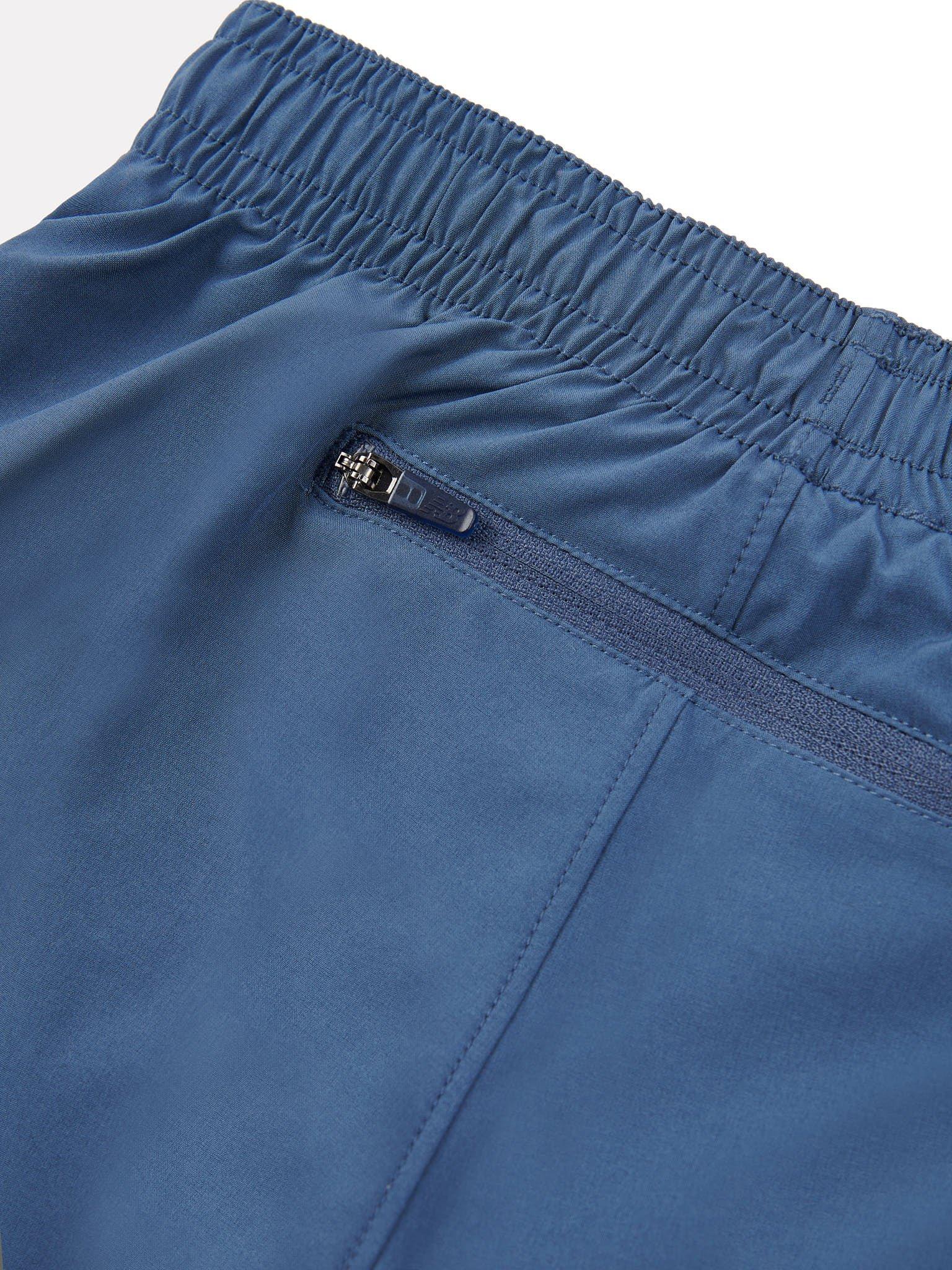 Product image 9 of 9, which shows New Balance Kids' Athletics Woven Shorts, Vintage Indigo, 7-8 years